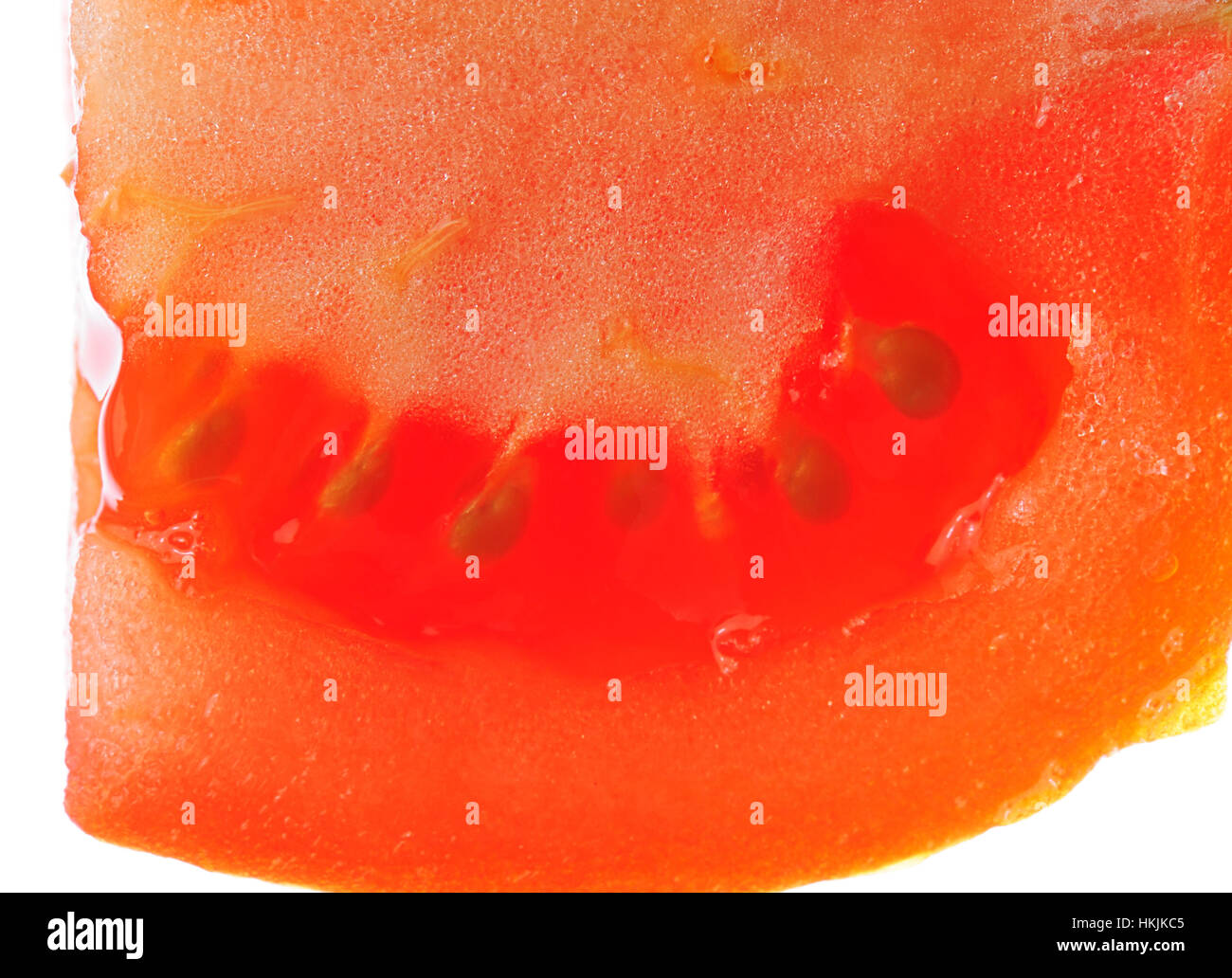 Tomaten Samen lebendige Scheibe isoliert auf weiss schneiden Stockfoto