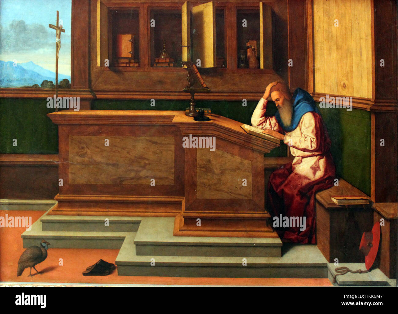 Ein Gemälde aus dem Jahr 1514 mit dem Titel *Catena hl. Hieronymus im Studierzimmer* (Heiliger Jerome in seiner Studie), illustriert das wissenschaftliche und spirituelle Leben des Heiligen Jerome. Das Kunstwerk ist ein Beispiel für religiöse Kunst der Renaissance. Stockfoto