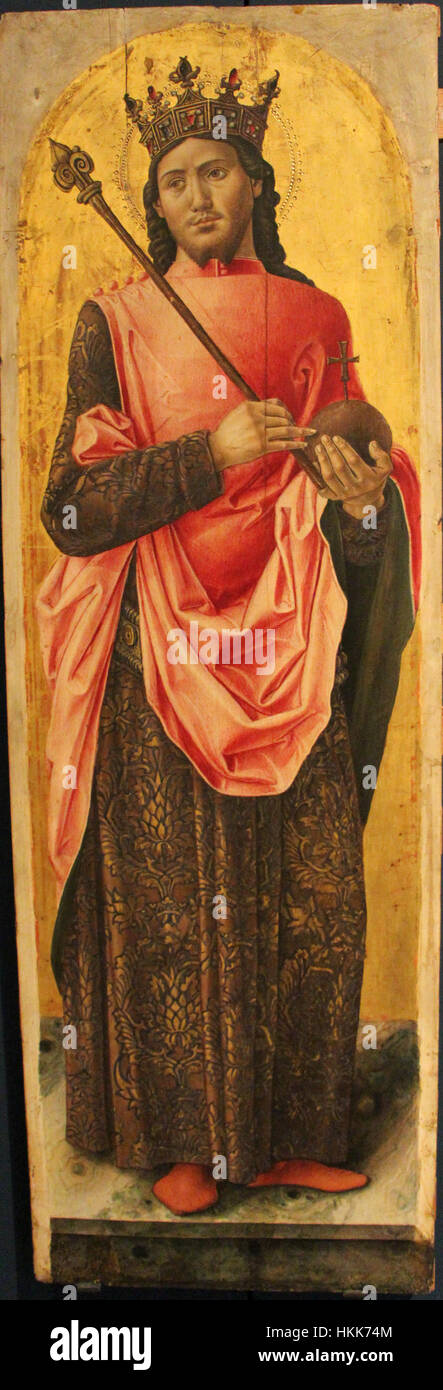 Ein Renaissance-Gemälde von Bartolomeo Vivarini, das den Heiligen Ambrosius zeigt, der einen Segen gibt, umgeben von hingebungsvollen Anhängern und anderen Heiligen. Das Kunstwerk spiegelt die religiösen Themen wider, die in der venezianischen Kunst des 15. Jahrhunderts üblich sind. Stockfoto