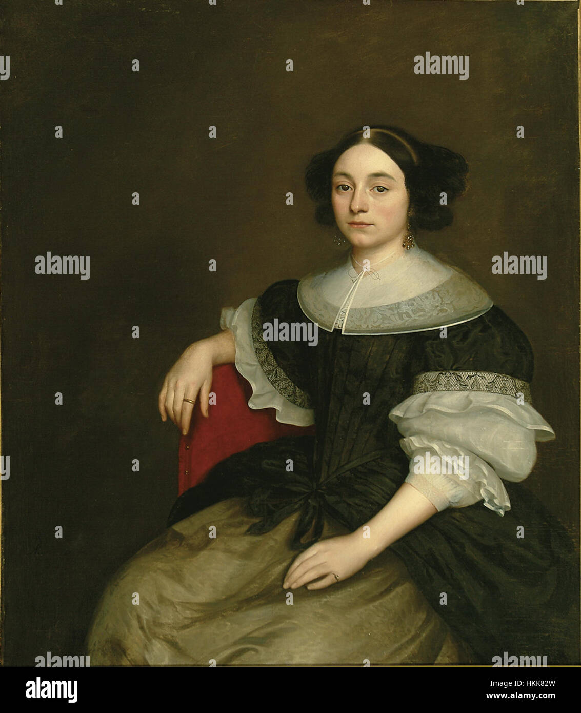 Dieses Porträt von Abraham Ragueneau zeigt eine Dame im traditionellen Stil des 19. Jahrhunderts. Ragueneaus Werk unterstreicht die Eleganz und Anmut des Motivs durch feine Details und eine klassische Porträtdarstellung. Stockfoto