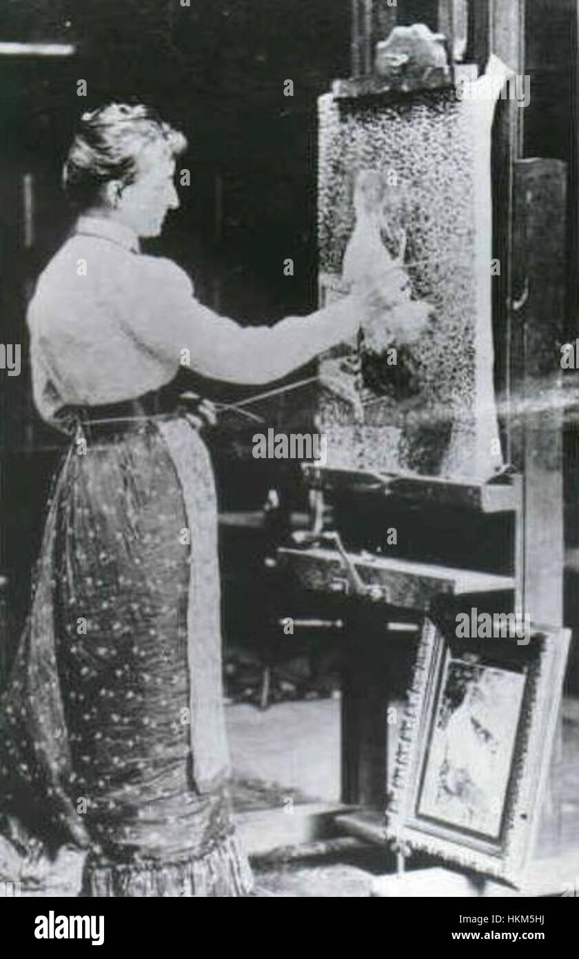 Dieses Gemälde von Anna Boch zeigt die Künstlerin in ihrem Atelier, umgeben von ihren Werken. Boch, eine prominente belgische Malerin aus dem 19. Jahrhundert, war bekannt für ihre Beiträge zum Post-Impressionismus und Mitglied der Avantgarde-Künstlergruppe Les XX. Stockfoto