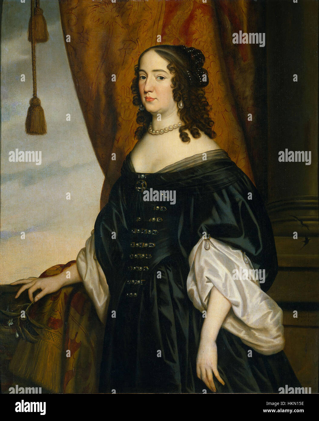 Ein Porträt von Amalia van Solms, gemalt von Gerard van Honthorst im Jahr 1650. Amalia war die Ehefrau von Prinz Maurice von Nassau und dieses Gemälde fängt sie in würdevoller Pose ein, die ihren Status in der niederländischen Gesellschaft im 17. Jahrhundert widerspiegelt. Das Werk ist bekannt für seine Verwendung von Licht und Schatten, ein Markenzeichen von Honthorsts Stil. Stockfoto
