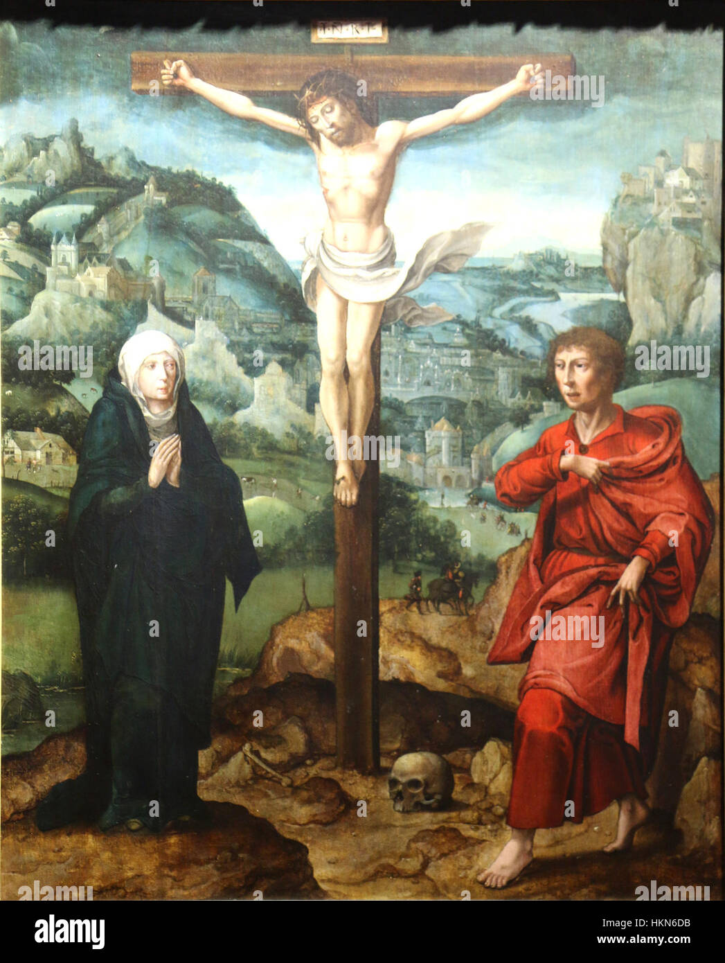 Aelbrecht Bouts’ Le Christ en croix ist ein ergreifendes religiöses Gemälde, das Christus am Kreuz darstellt. Das Kunstwerk unterstreicht den detaillierten Ansatz von Bouts zur religiösen Ikonographie und seine Verwendung lebendiger Farben, um die emotionale Intensität der Szene zu vermitteln. Stockfoto