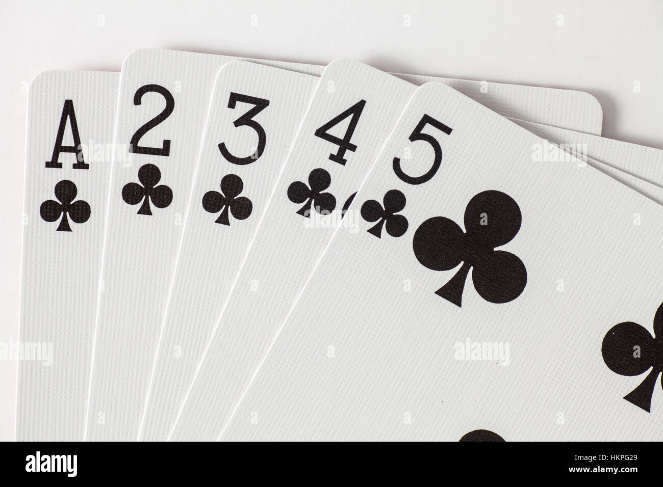 Spielkarten niedrige Straight Flush in Clubs Stockfoto