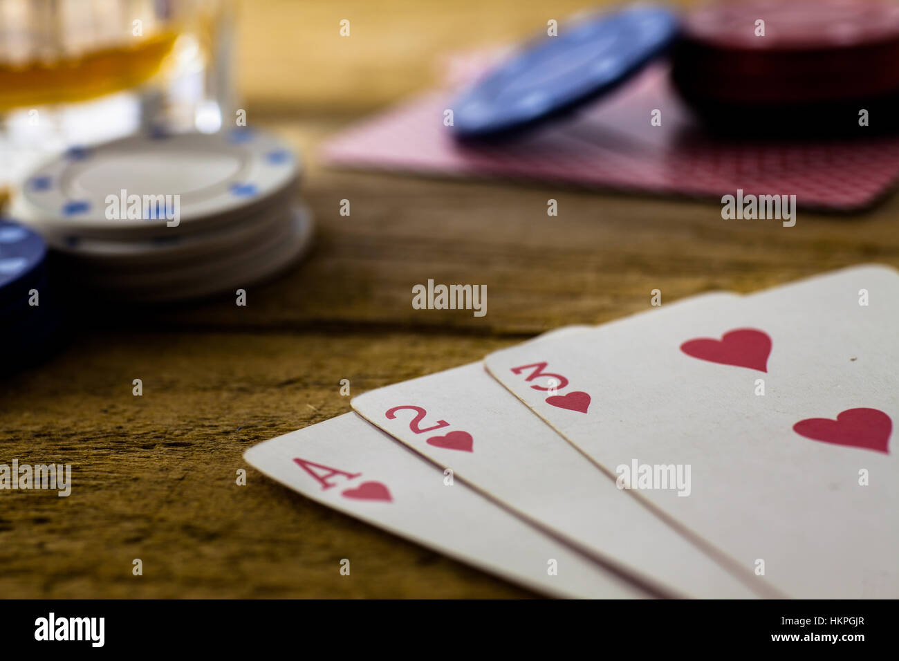 Ass, zwei, drei Herzen Stockfoto