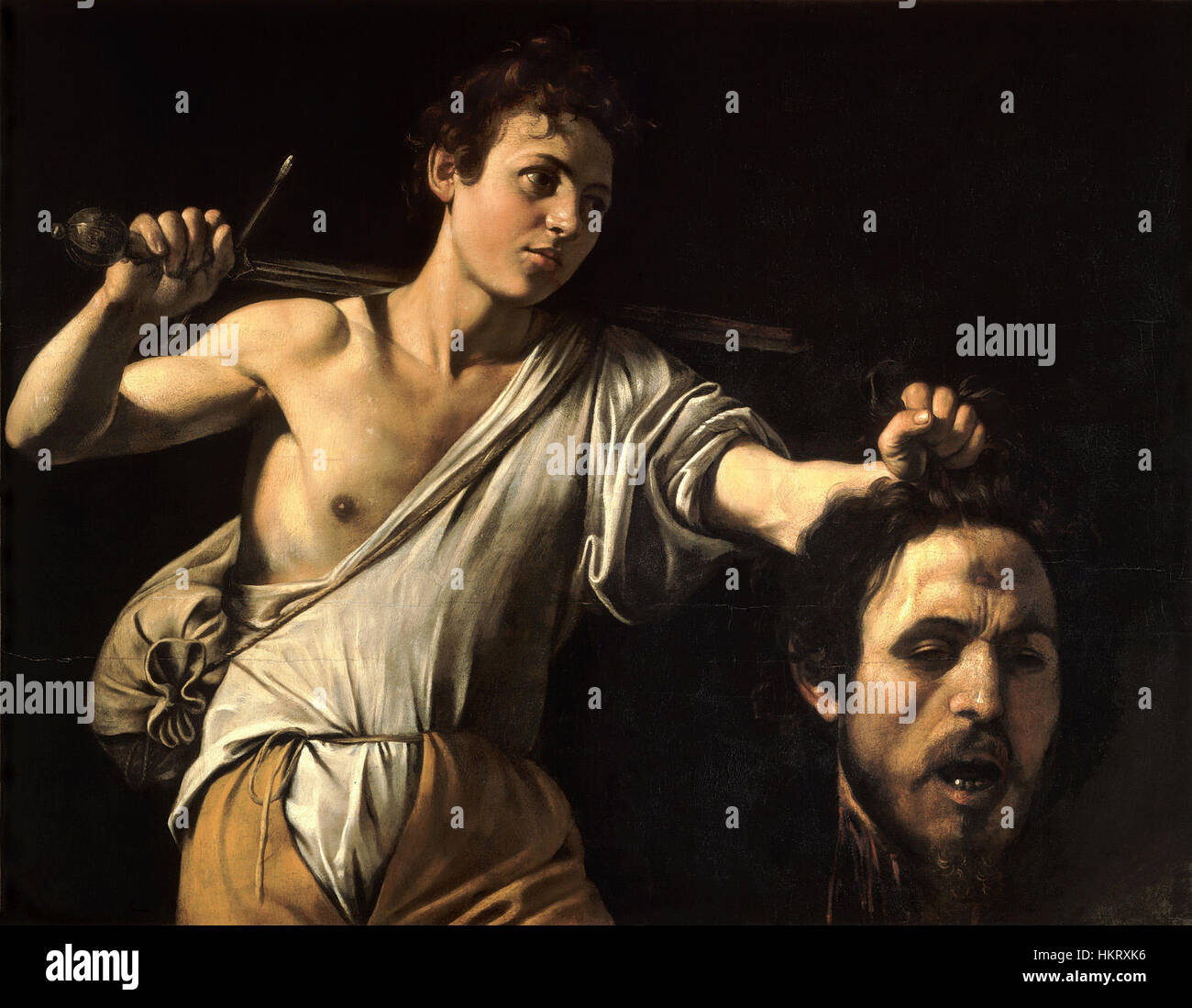 David mit dem Kopf von Goliath-Caravaggio (c.1606-7) Stockfoto