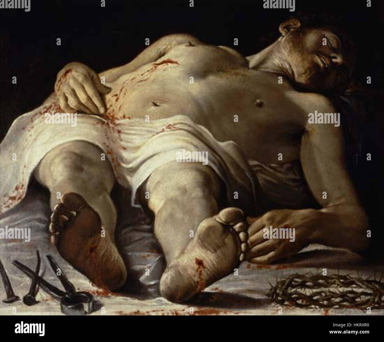 Dieses ikonische Gemälde „Dead Christ“ von Andrea Mantegna zeigt den Körper Christi nach seiner Kreuzigung in einer schroffen, dramatischen Pose. Das Gemälde ist bekannt für seine emotionale Intensität und die innovative Nutzung der Perspektive, die Mantegnas Fähigkeit, den menschlichen Körper zu repräsentieren und eine düstere, reflektierende Stimmung zu erzeugen, unterstreicht. Dieses Werk gilt als ein Meisterwerk der Renaissance und verkörpert sowohl künstlerische als auch religiöse Bedeutung. Stockfoto