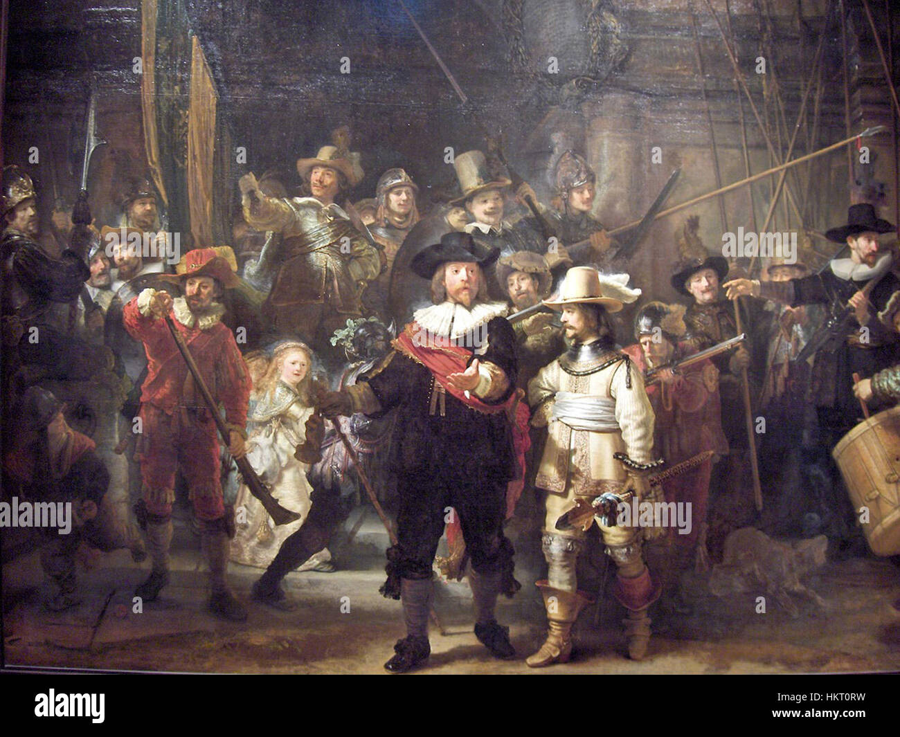 „De Nachtwacht“ ist ein berühmtes Gemälde von Rembrandt aus dem Jahr 1642, das eine Gruppe von Milizen in einer dramatischen und detaillierten Komposition darstellt. Das Kunstwerk zeigt Rembrandts Beherrschung von Licht, Schatten und Textur. Stockfoto