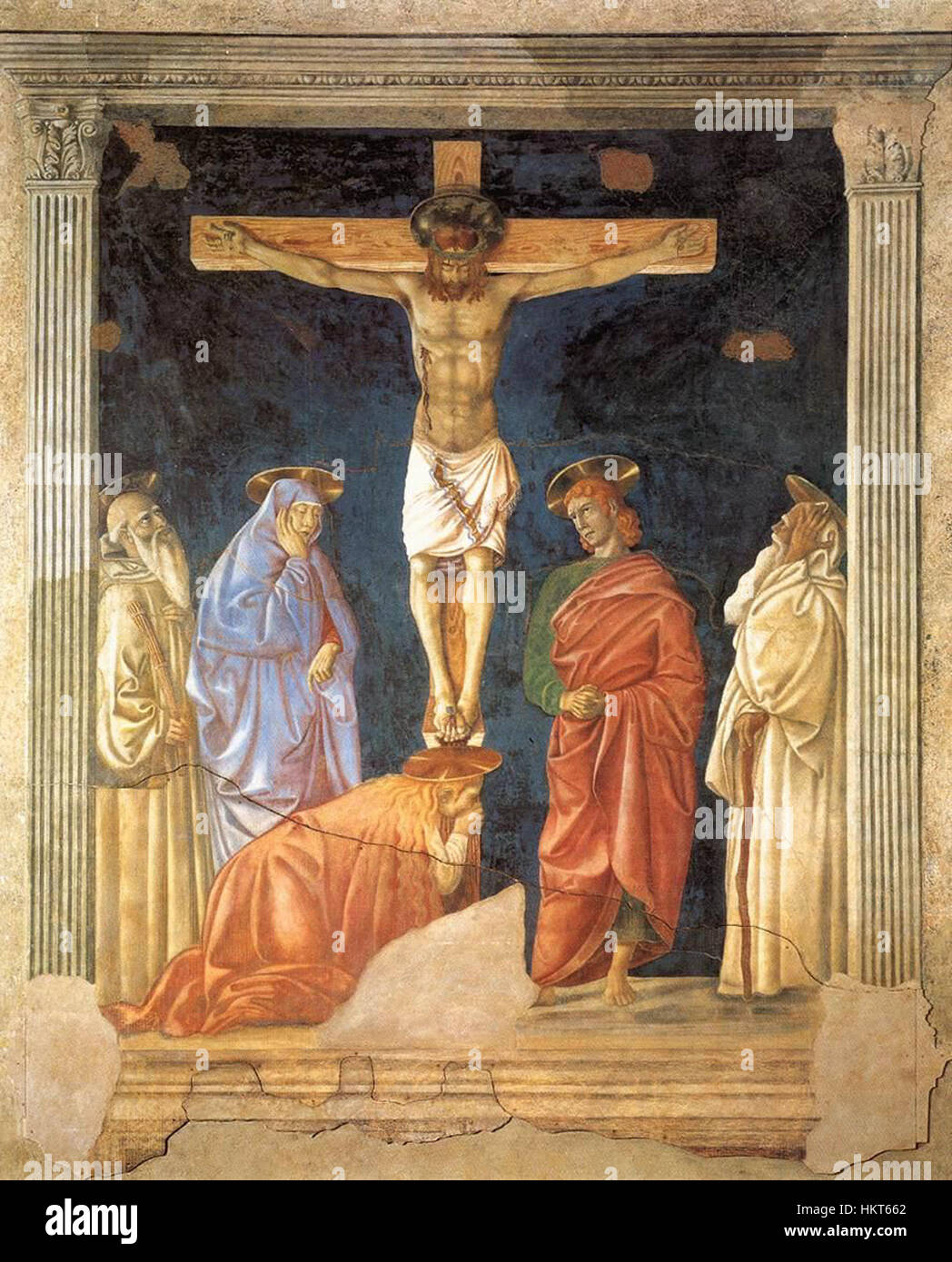 Andrea del Castagnos „Kreuzigung und Heilige“ ist eine meisterhafte Darstellung der Kreuzigungsszene, die Christus am Kreuz, umgeben von Heiligen, darstellt. Das Gemälde ist ein wichtiges Werk religiöser Kunst aus der Renaissance. Stockfoto