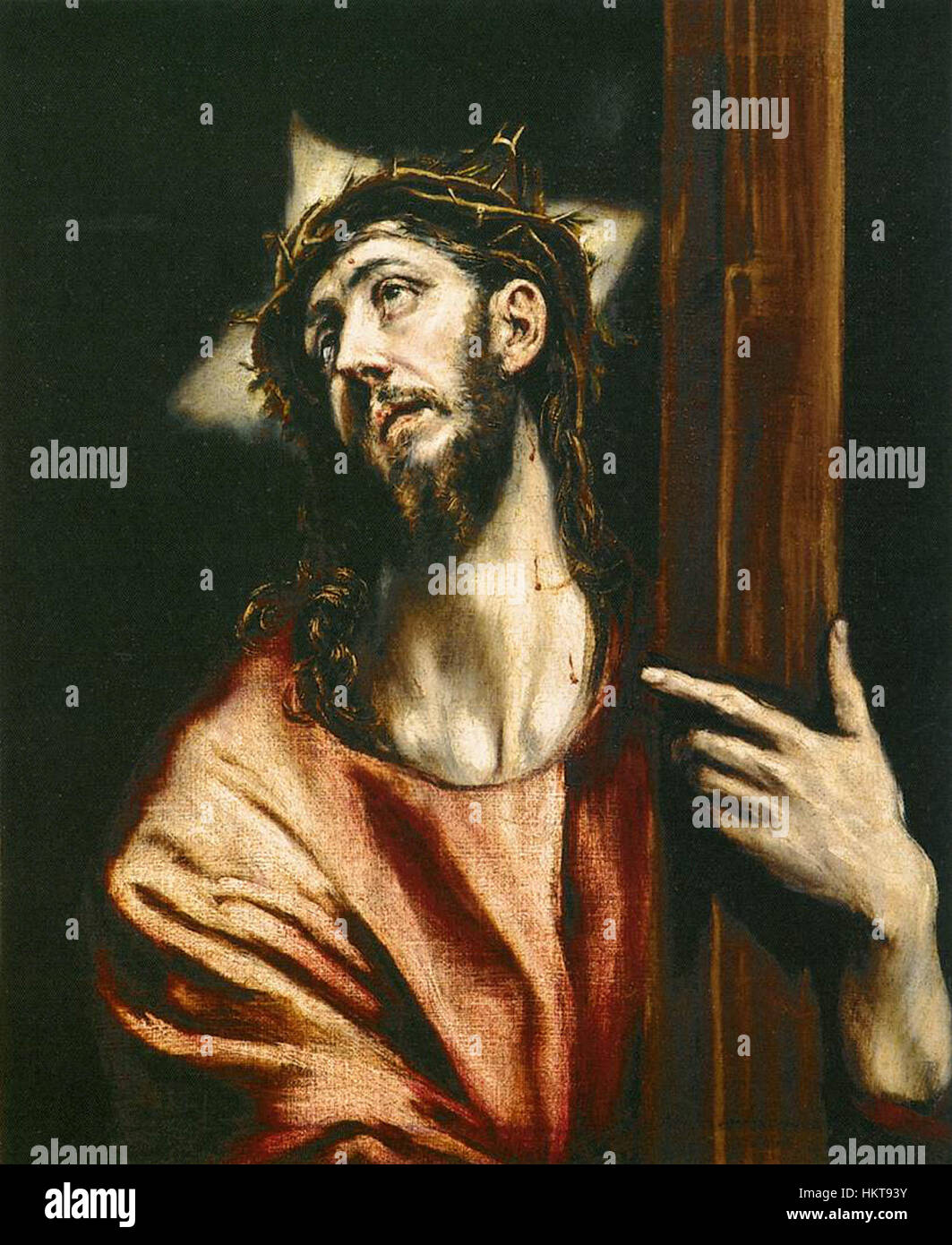 El Grecos „Christus, der das Kreuz hält“ ist ein mächtiges religiöses Gemälde, das das Leiden Christi mit dramatischem Licht- und Schatteneinsatz einfängt, charakteristisch für sein späteres Werk. Es veranschaulicht den einzigartigen Expressionismus des Künstlers. Stockfoto