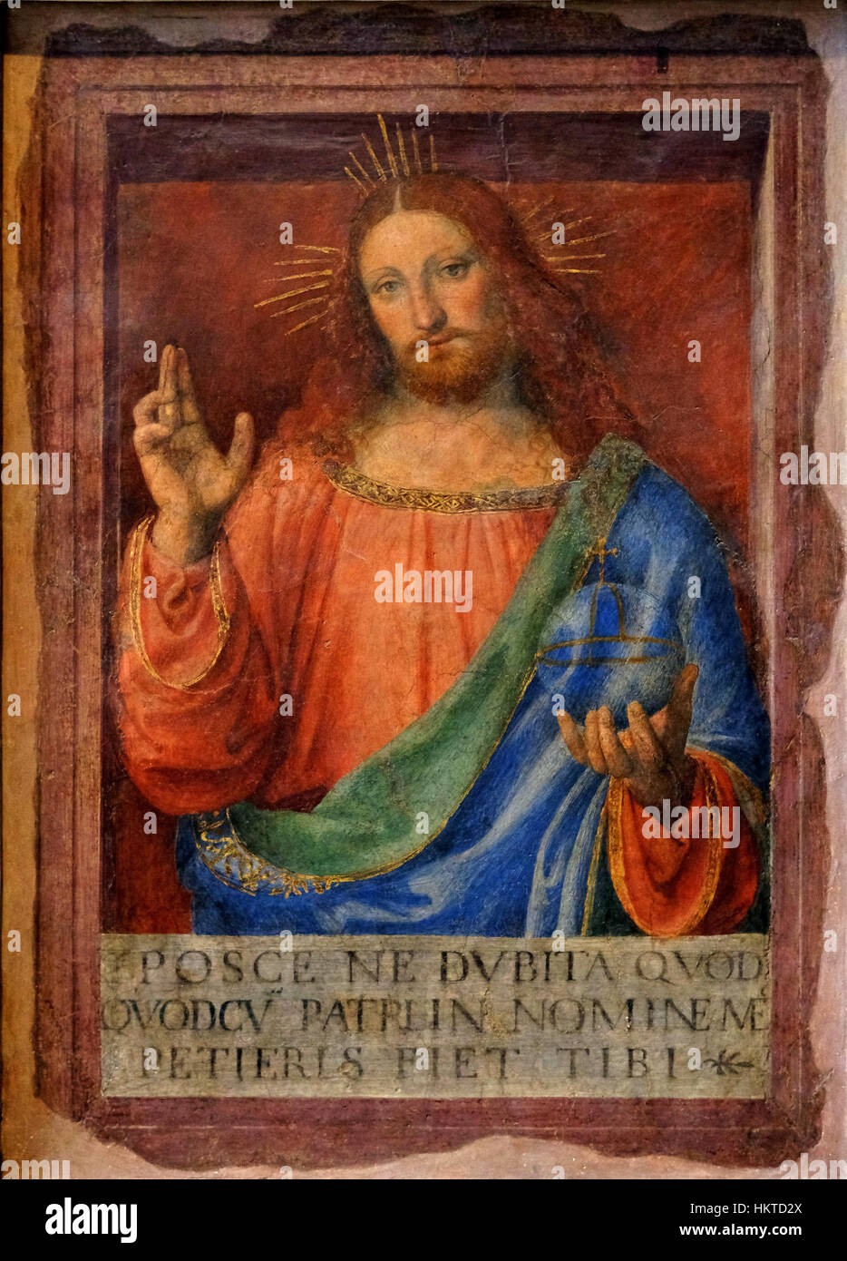 Luinis *Christ benissant* (Christus-Segen), der im Louvre untergebracht ist, stellt Christus in einer ruhigen und feierlichen segnenden Geste dar. Das Gemälde ist ein schönes Beispiel für religiöse Kunst der Renaissance und zeigt Luinis feinfühligen Umgang mit Licht und Form. Stockfoto