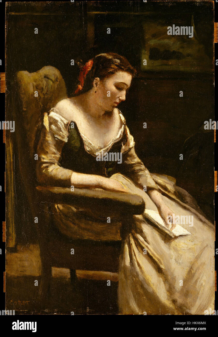 Jean-Baptiste-Camille Corot, ein französischer Künstler des 19. Jahrhunderts, malte „Der Brief“, eine ländliche Szene einer Frau, die einen Brief liest, und präsentierte seinen charakteristischen Einsatz von Licht und Pinselführung. Stockfoto