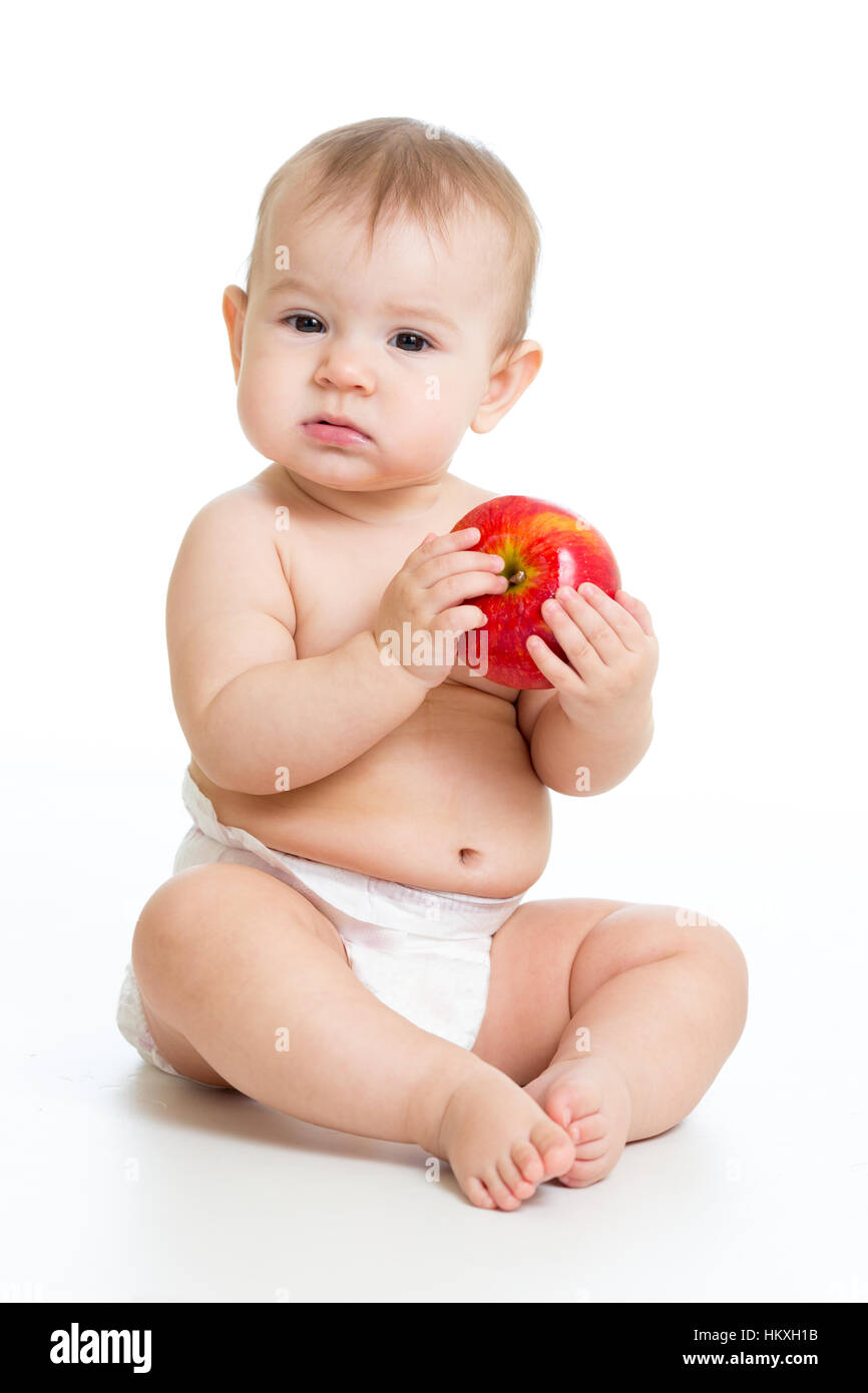Acht Monate altes Baby-sitter mit Apfel Stockfoto