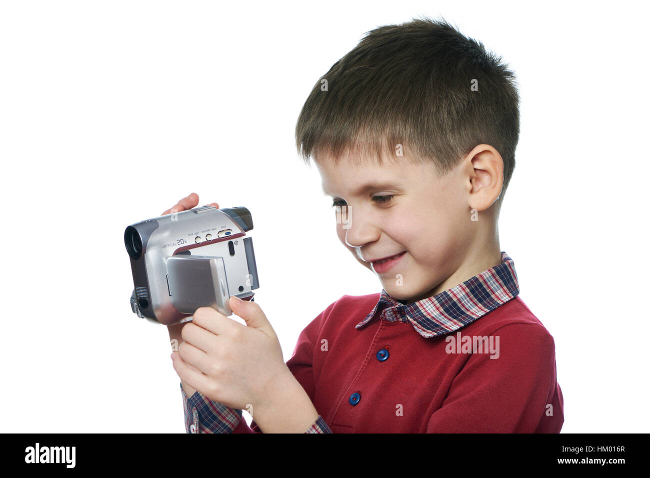 Kleiner Junge mit einer Videokamera isoliert weiß Stockfoto