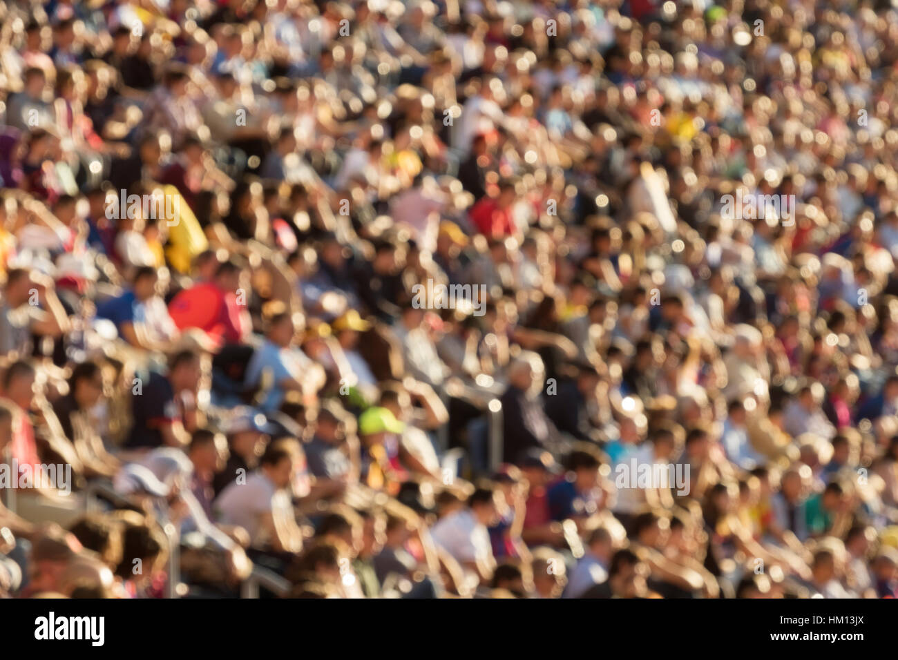 Menschen, die Teilnahme an einer Veranstaltung in einem Stadion verschwommen Stockfoto