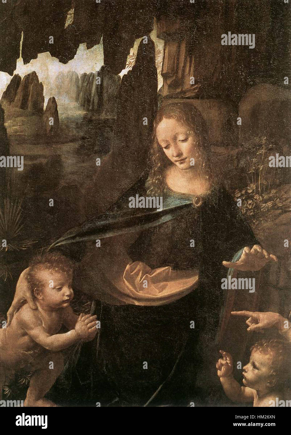 Ein detaillierter Teil von Leonardo da Vincis „Jungfrau der Felsen“ zeigt seine Meisterschaft in der Aufnahme von Licht, Schatten und zarten Gesichtsausdrücken. Das Gemälde ist eine ikonische Darstellung der Renaissance-Kunst und des religiösen Symbolismus. Stockfoto