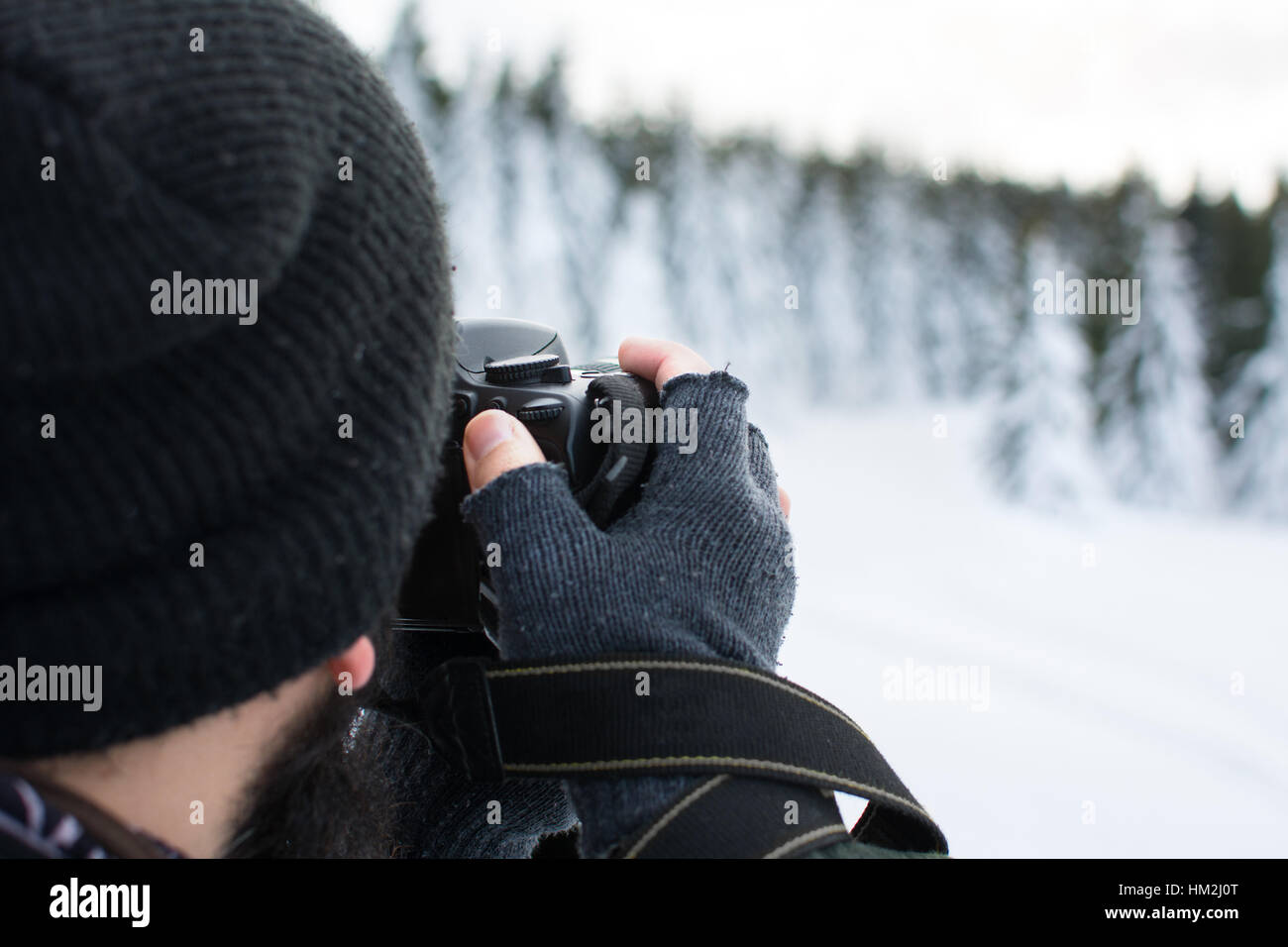 Fotografen unter Bild einer Winterlandschaft Stockfoto
