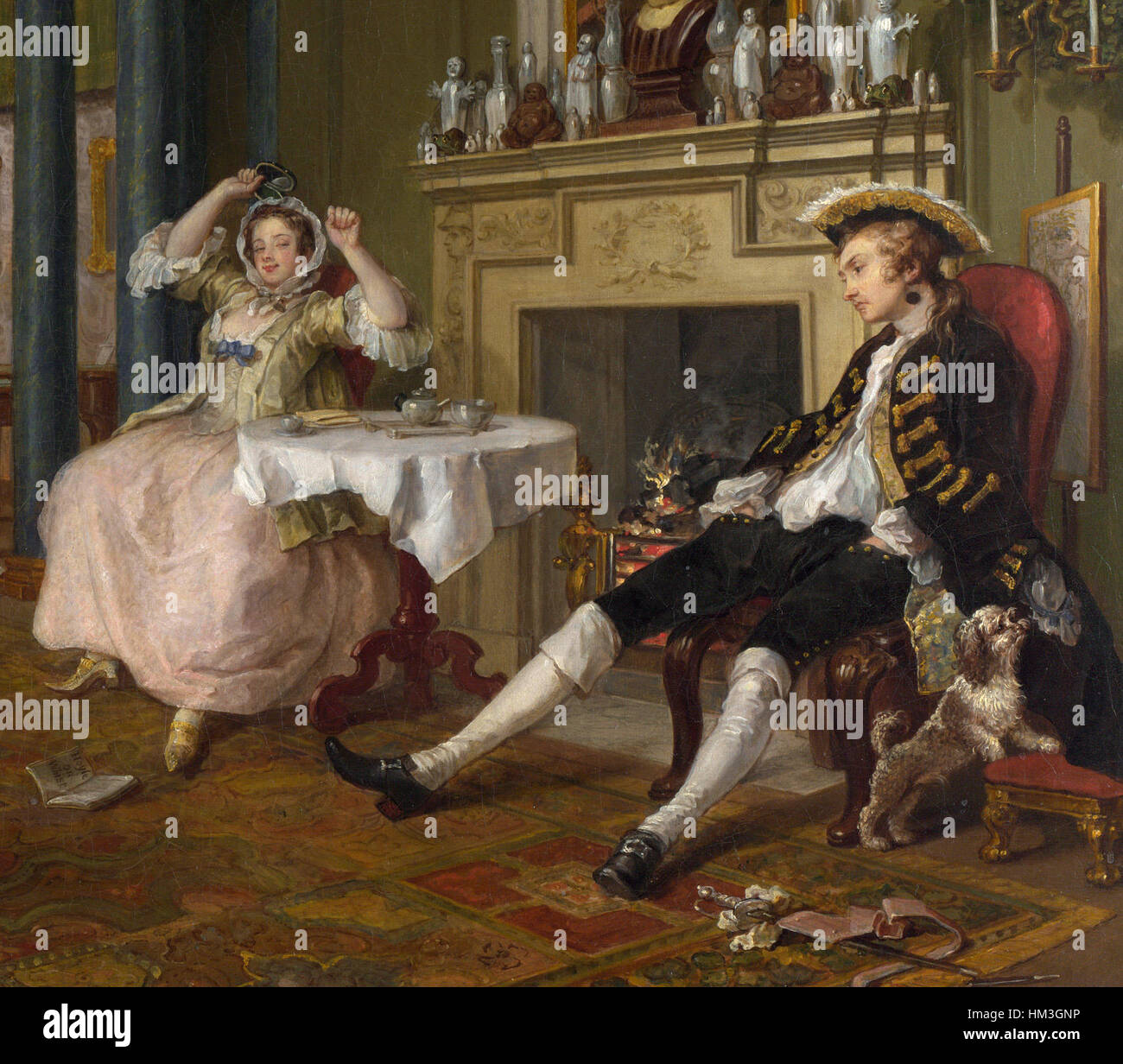 Die „Tête-à-Tête“ aus William Hogarths „Marriage A-la-Mode“-Serie schildert die soziale Dynamik der britischen Ehe des 18. Jahrhunderts. Die detaillierte Szene beleuchtet Themen der Untreue und Gesellschaftskritik. Stockfoto