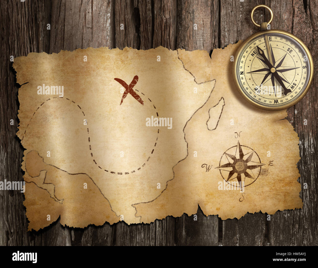 alten nautischen Kompass auf Holztisch mit Schatzkarte Stockfoto