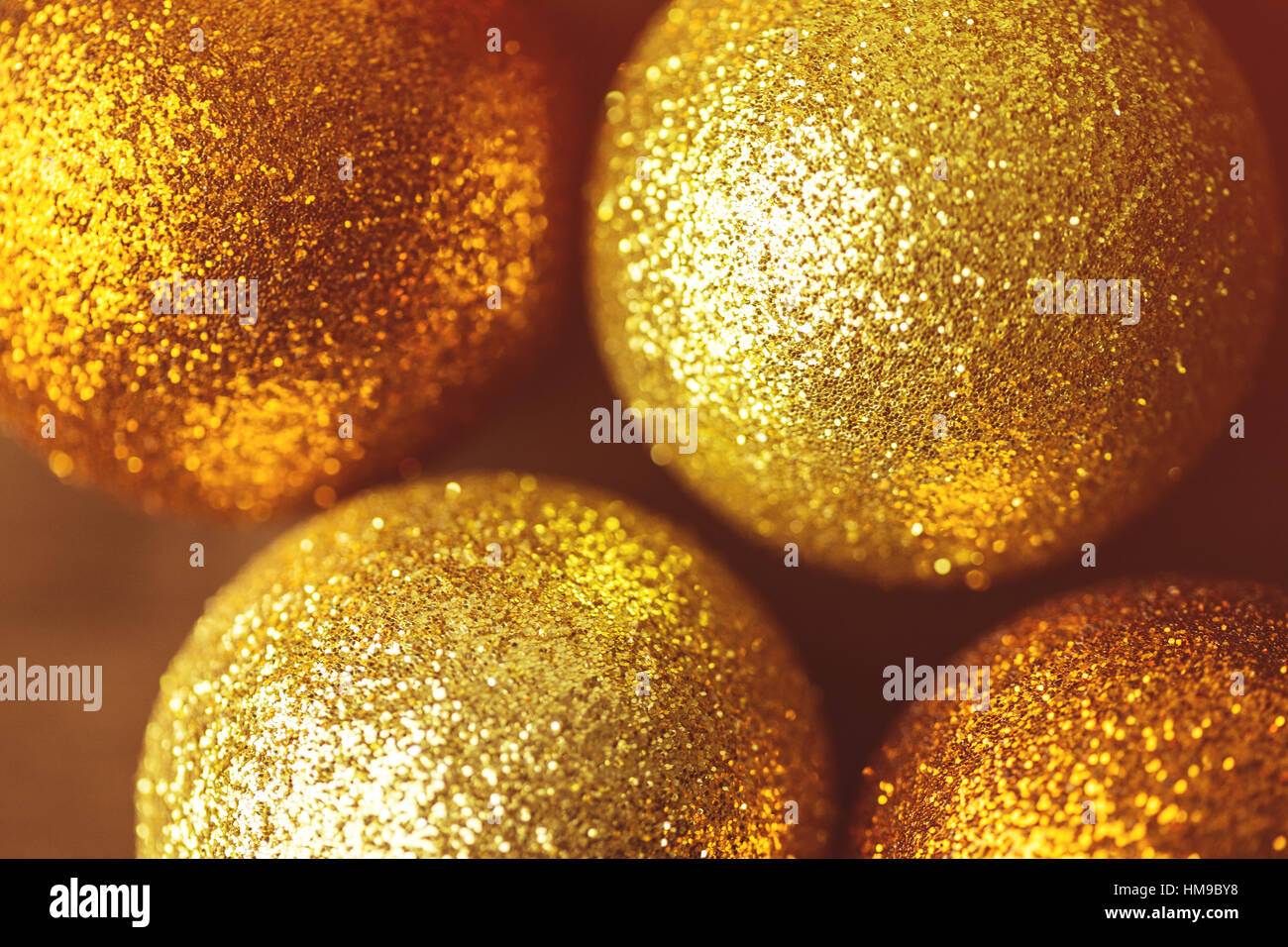 Gold-Glitter Ball Dekorationen Closeup abstrakt Stockfoto