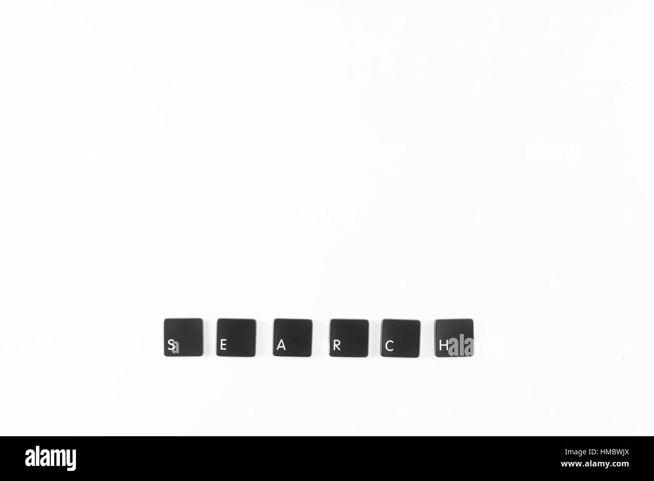 Suche Wort geschrieben mit schwarzen Computer-Tastatur-Tasten Stockfoto