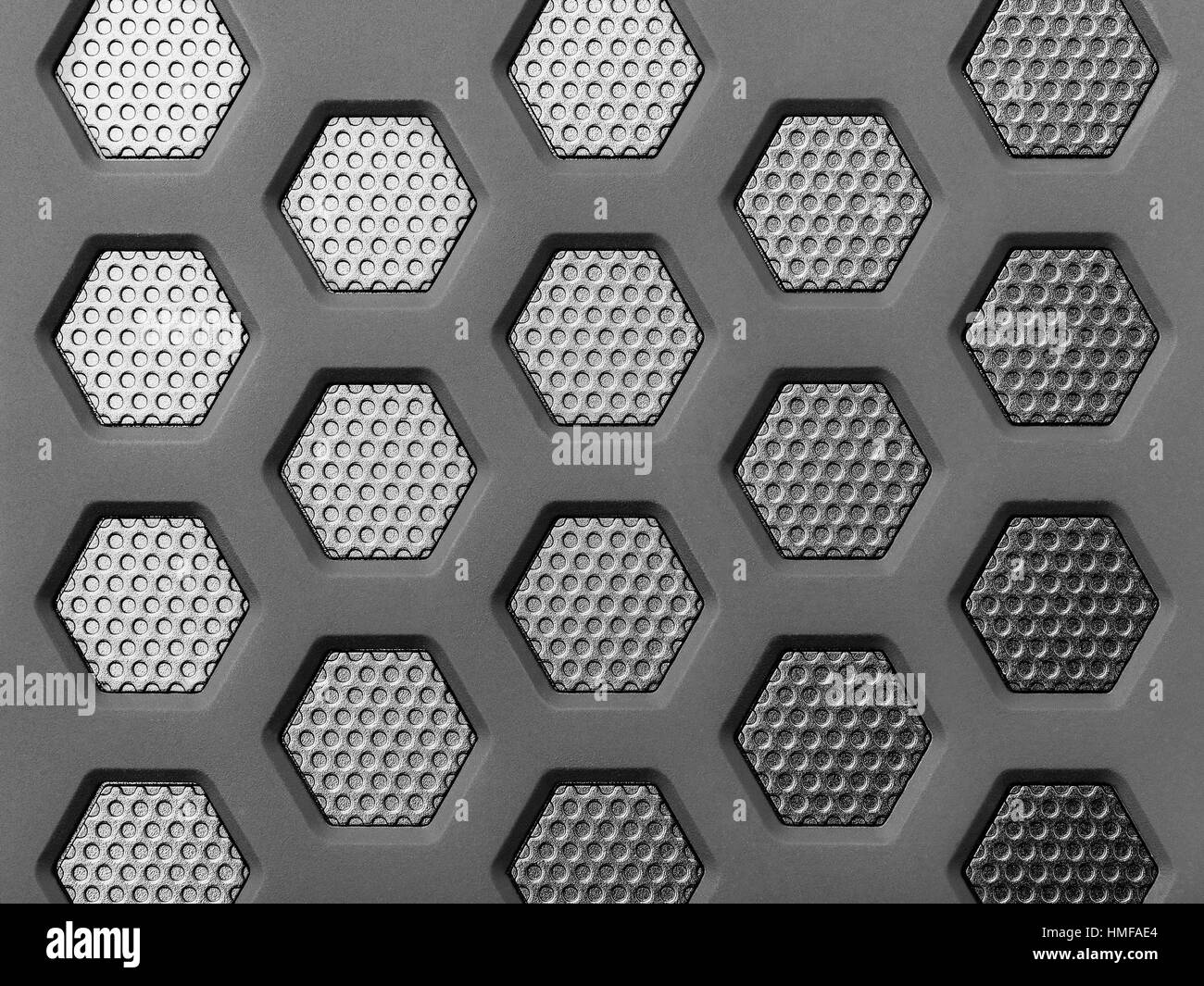 Modernen Hintergrund mit einem Metall Sechsecke und einem schwarzen Rand. Makroaufnahme. Stockfoto