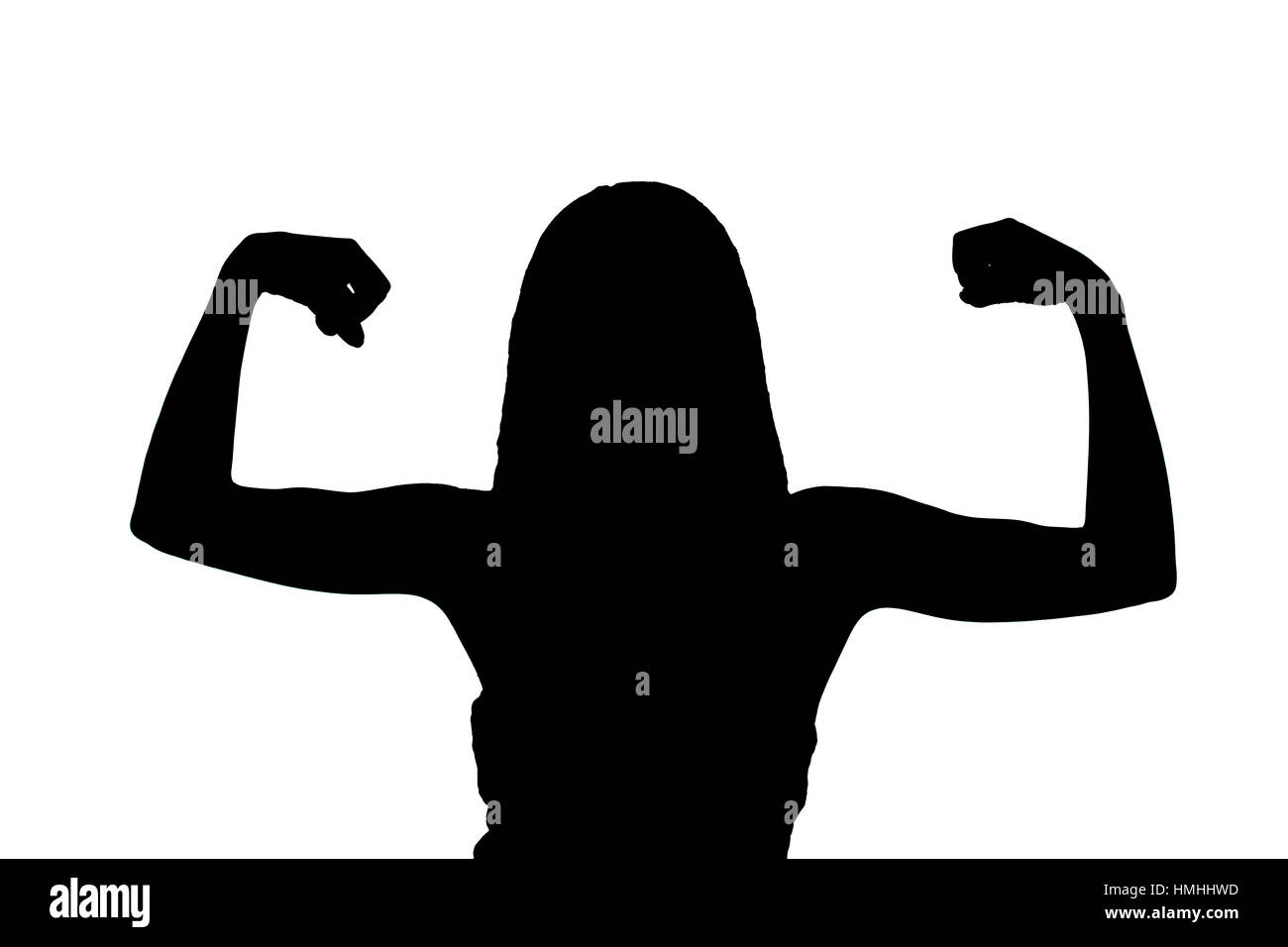 Silhouette eines Mädchens zeigen ihre Muskeln Stockfoto