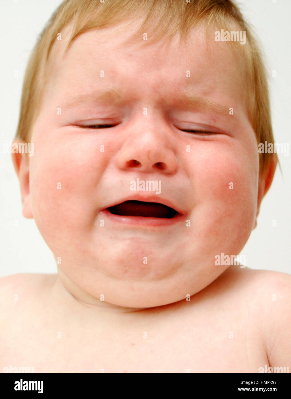 7 Monate altes Baby schreien Stockfoto