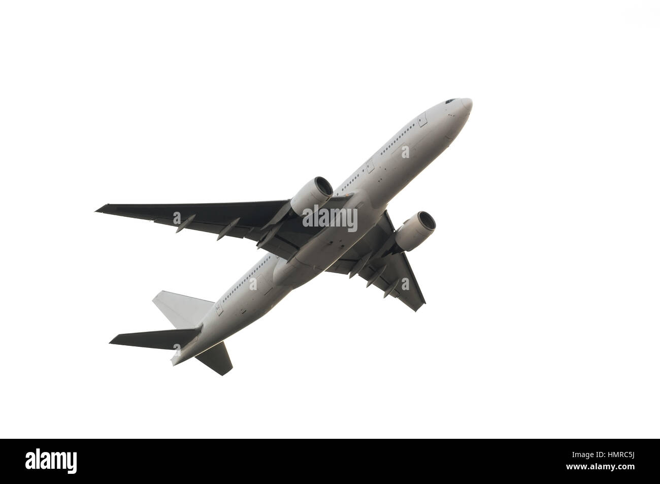 Boeing 777-200 vom Flughafen abheben. Stockfoto