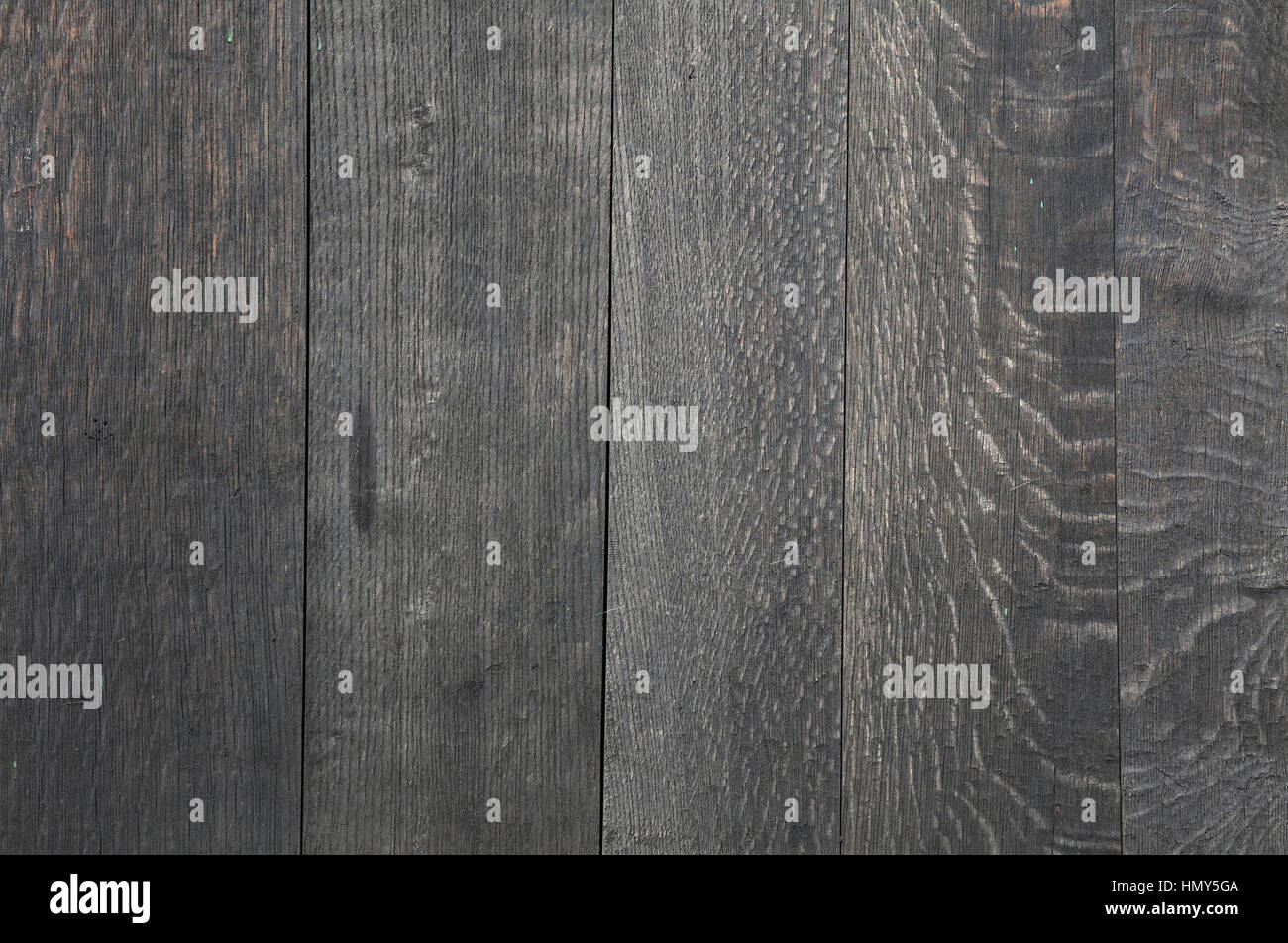 Alte Vintage Alter Grunge ungleichmäßige grau verblasst vertikalen Holzbohlen Textur Hintergrund Stockfoto
