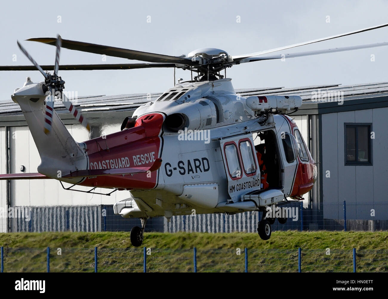 HM-Küstenwache Hubschrauber, Portland, Dorset. Teilnahme an einem Patienten Rettungs-Übung. Stockfoto