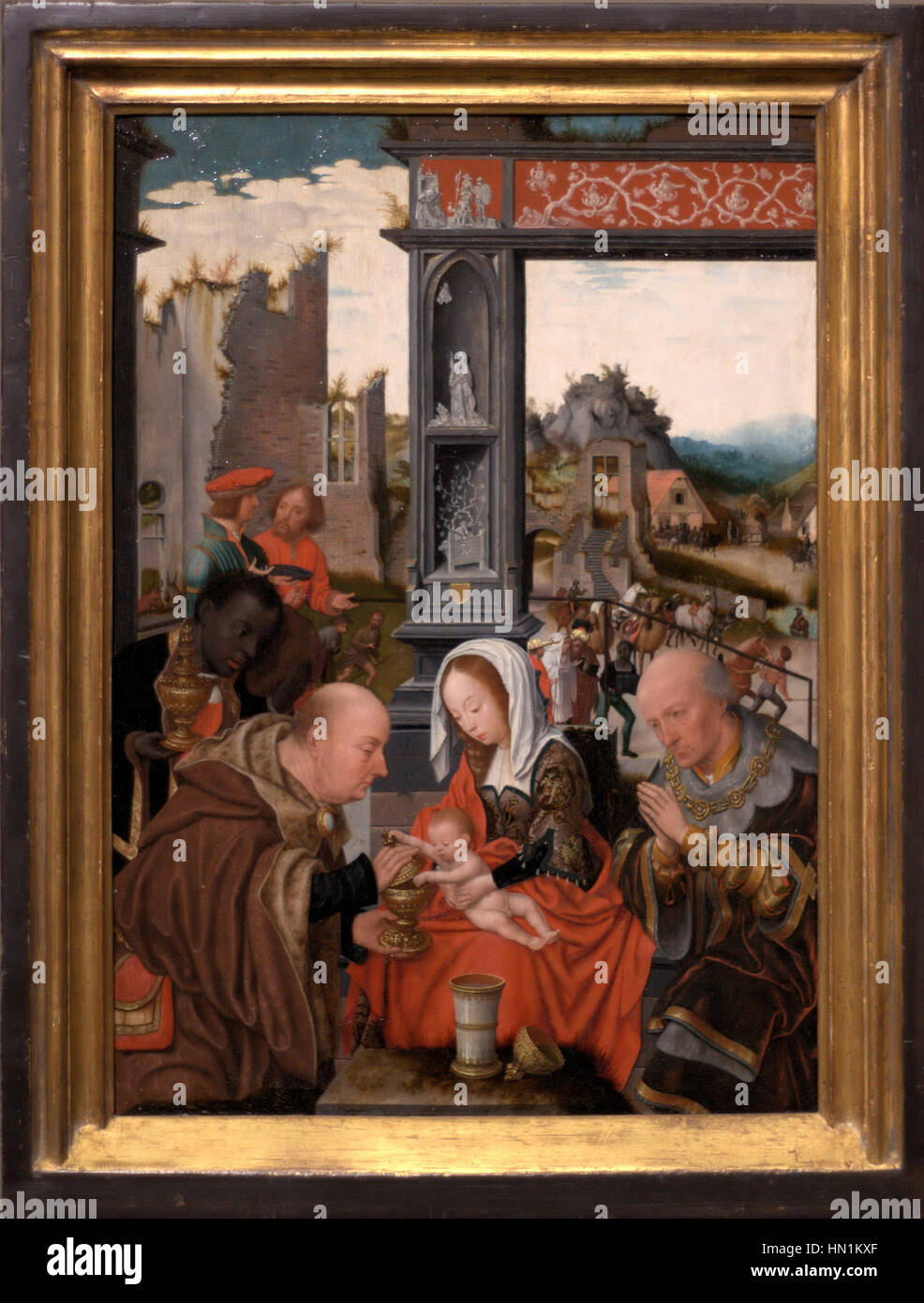 Jan Mostaerts „de aanbidding van de koningen“ (die Anbetung der Könige) ist ein religiöses Gemälde, das die drei Könige zeigt, die dem neugeborenen Christus Geschenke überreichen. Dieses Werk ist ein Paradebeispiel religiöser Kunst der Renaissance und zeigt Mostaerts detaillierten Ansatz zu biblischen Szenen. Stockfoto