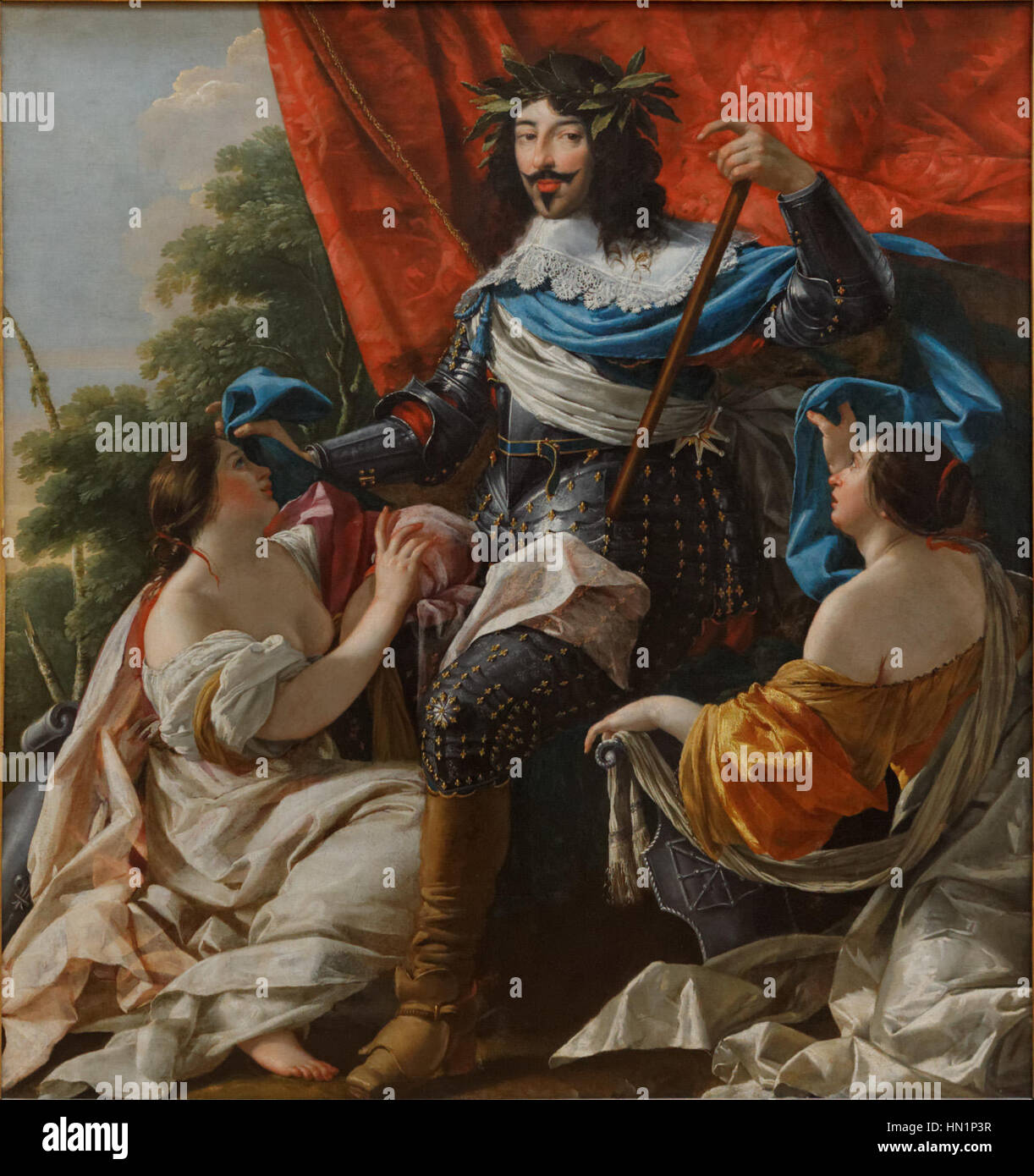 Dieses Porträt von König Ludwig XIII. Des französischen Künstlers Simon Vouet, das im Louvre untergebracht ist, fängt den Monarchen in seinen königlichen Regalien ein. Vouets Werk betont die Hochmut und die Pracht der Herrschaft Ludwigs XIII. Im frühen 17. Jahrhundert. Stockfoto