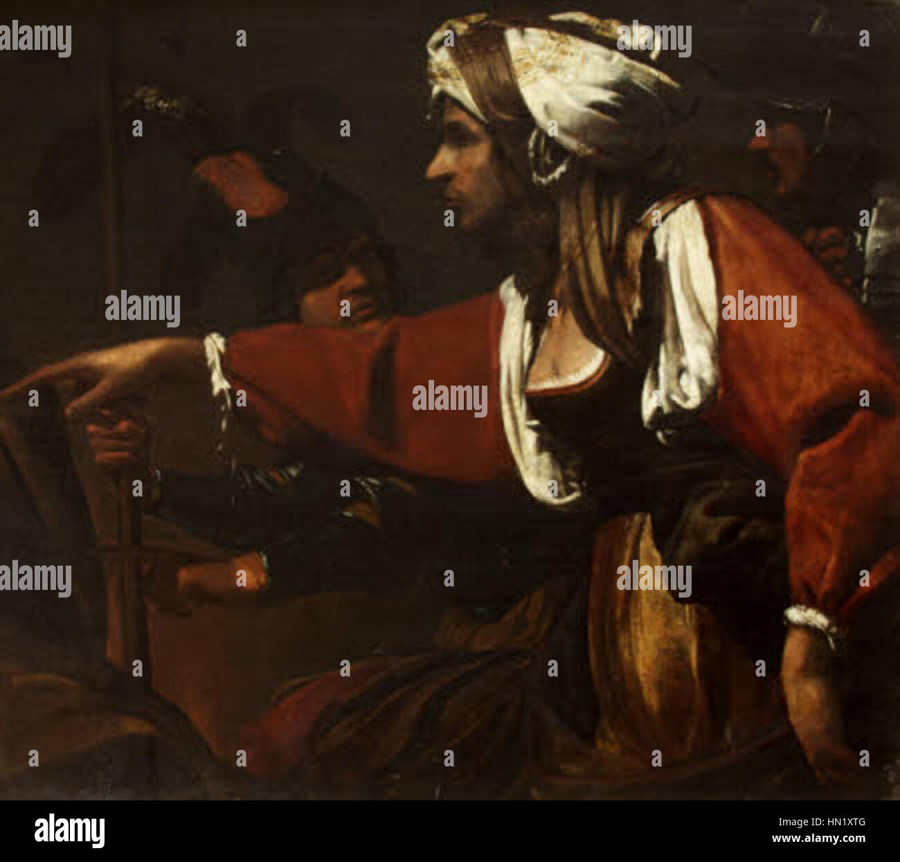 Dieses Fragment aus einem größeren Gemälde, „Leugnung des heiligen Petrus“, zeigt eine Magd im Moment der Befragung des heiligen Petrus. Das Kunstwerk spiegelt die emotionale Spannung und die religiösen Themen der biblischen Geschichte wider, wobei der Schwerpunkt auf dem Ausdruck der Dienerin und ihrer Interaktion mit dem Heiligen Peter liegt. Stockfoto