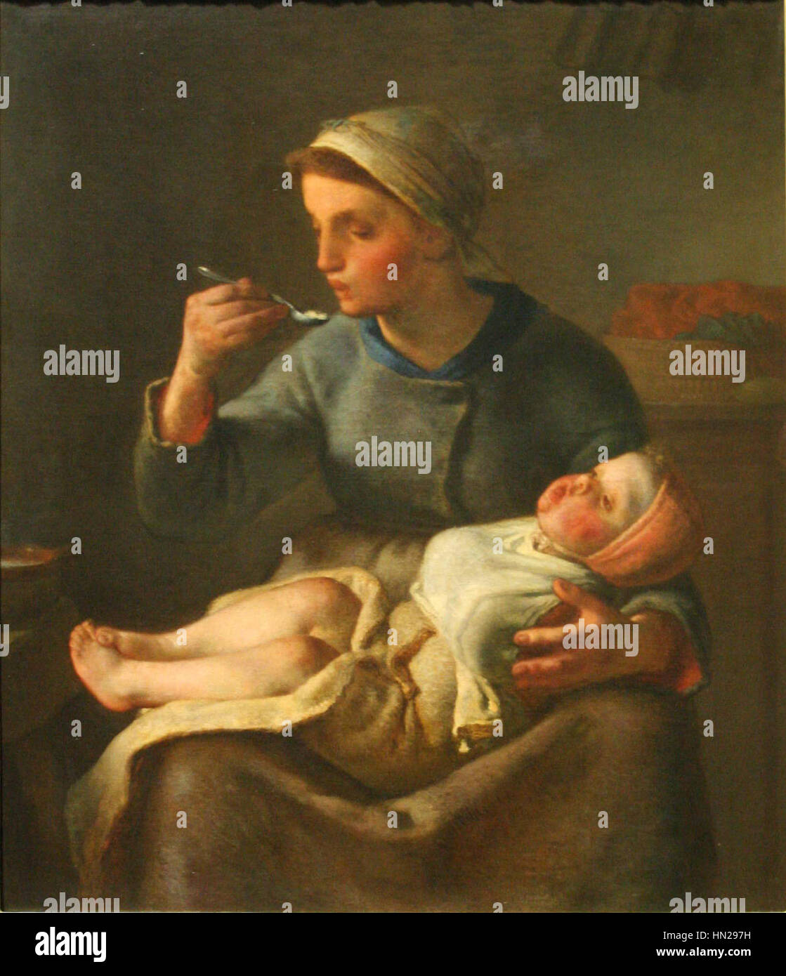 „La Bouillie“ von Jean-Francois Millet ist ein Genre-Gemälde, das eine ländliche Szene darstellt, in der eine Frau eine Mahlzeit zubereitet und das bescheidene Alltagsleben der Bauern im Frankreich des 19. Jahrhunderts betont. Das Gemälde fängt die Einfachheit und Authentizität der ländlichen Arbeit ein. Stockfoto