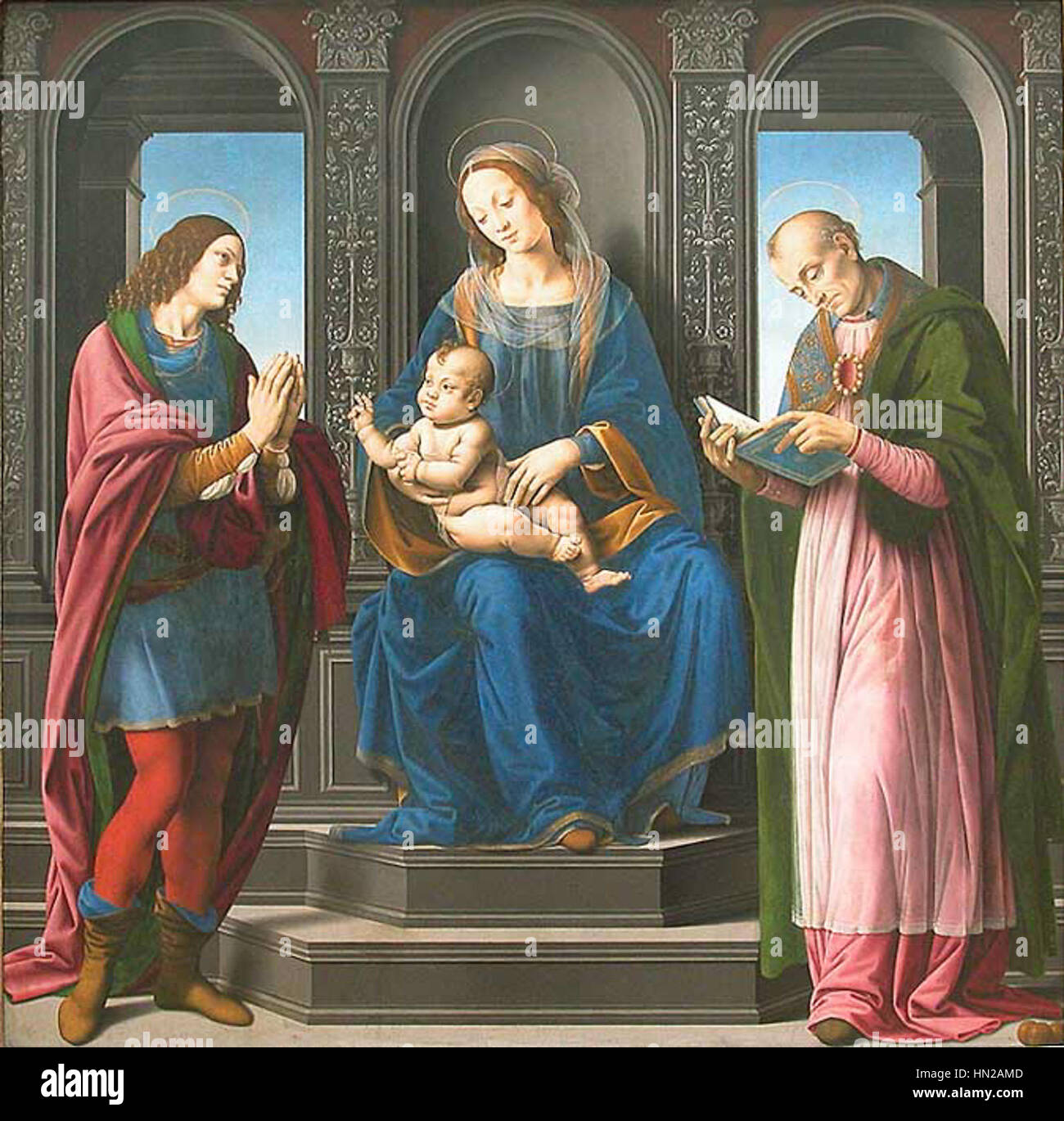 Lorenzo di Credis Gemälde „Jungfrau und Kind mit dem Heiligen Julian und dem Heiligen Nikolaus von Myra“ stellt die Jungfrau Maria mit dem Jesuskind dar, begleitet von dem Heiligen Julian und dem Heiligen Nikolaus. Das Werk, das im Louvre gehalten wird, ist ein schönes Beispiel für religiöse Kunst der Renaissance. Stockfoto