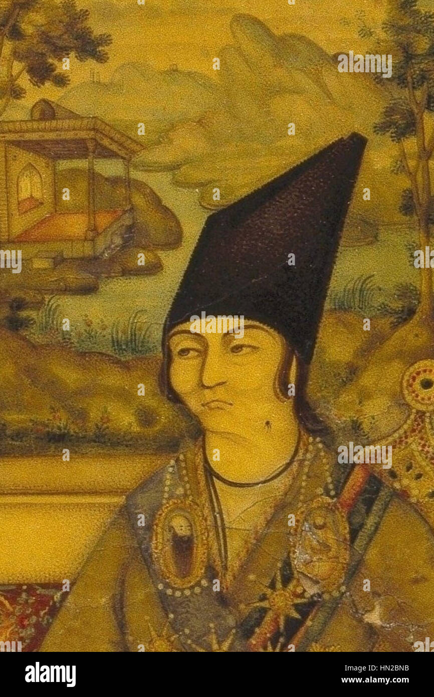 Manuchehr Khan Gorji war ein persischer Adels- und Militärführer während der Qajar-Ära. Dieses Bild zeigt seine formale Kleidung und seine militärische Haltung, typisch für seinen Rang innerhalb der Qajar-Dynastie, eine Periode, die von bedeutenden politischen und kulturellen Entwicklungen im Iran geprägt ist. Stockfoto