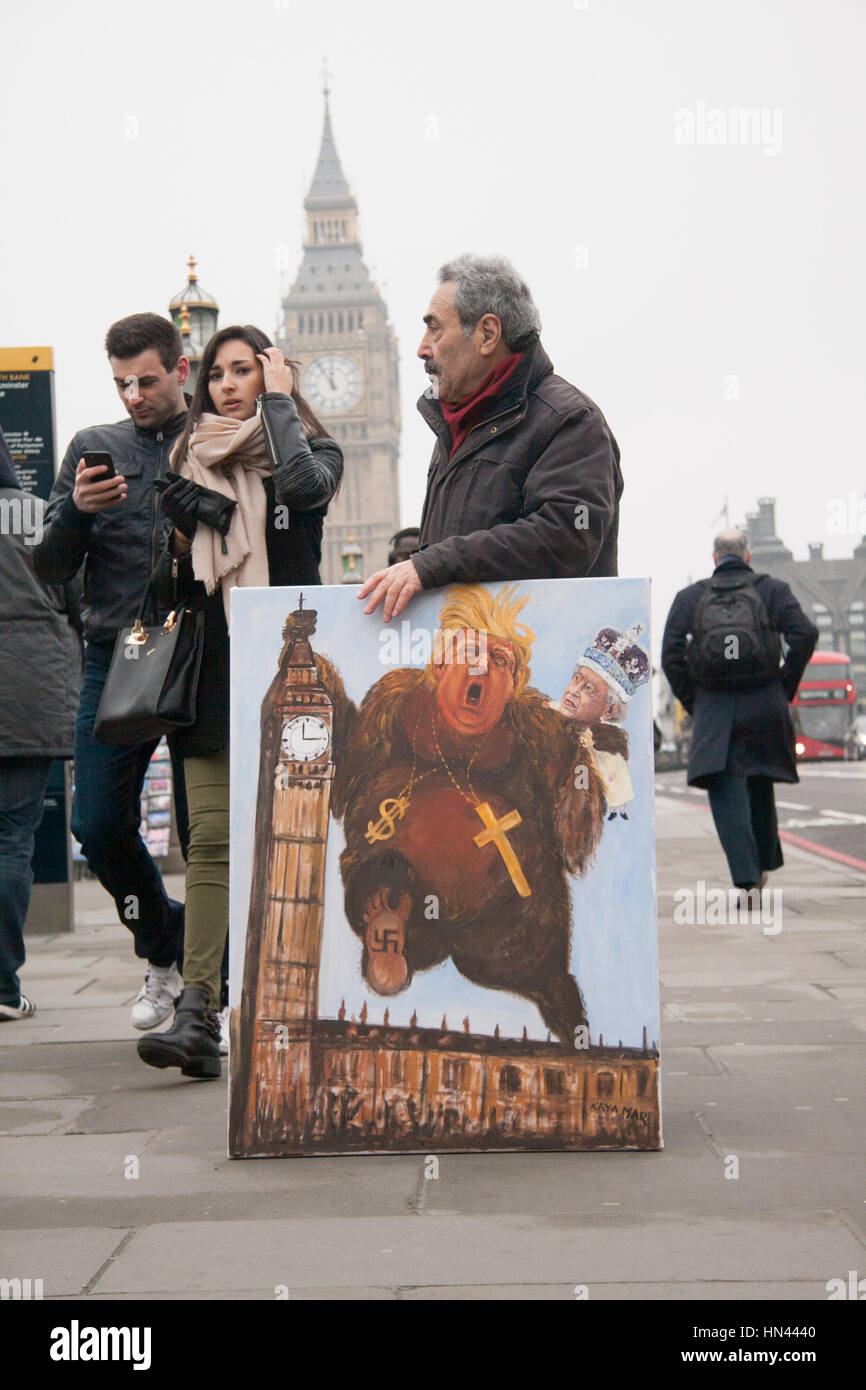 London, UK. 8. Februar 2017. Politische Satiriker Kaya Mar hält ein Gemälde auf Westminster Bridge als britische Abgeordnete des Parlaments für eine endgültige Abstimmung über den Gesetzentwurf Austritt auf das House Of Commons Guthaben festgelegt: Amer Ghazzal/Alamy Live-Nachrichten Stockfoto