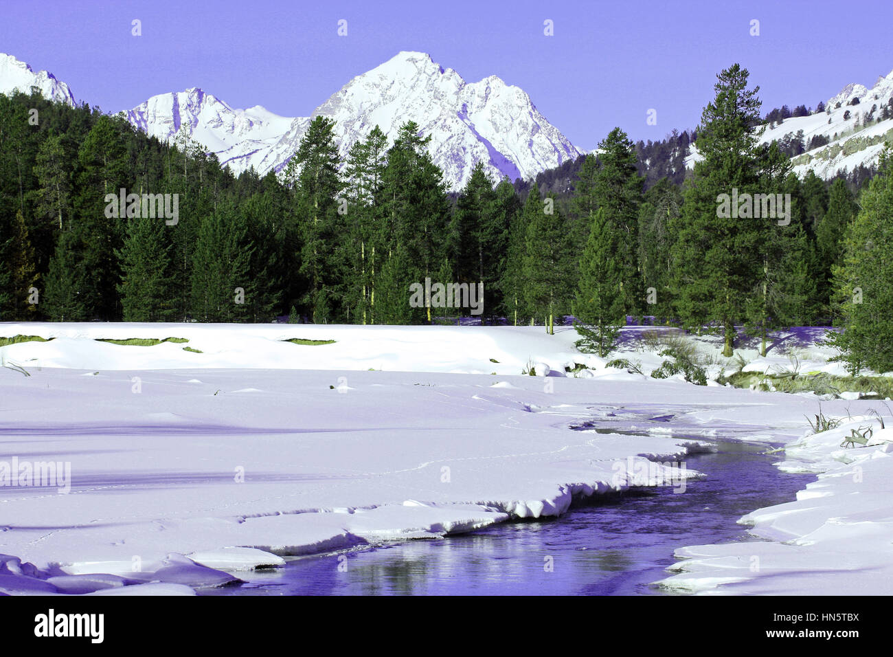 Stream im Winter vor Mount Moran, Grand Teton National Park, Jackson, Wyoming, USA Stockfoto