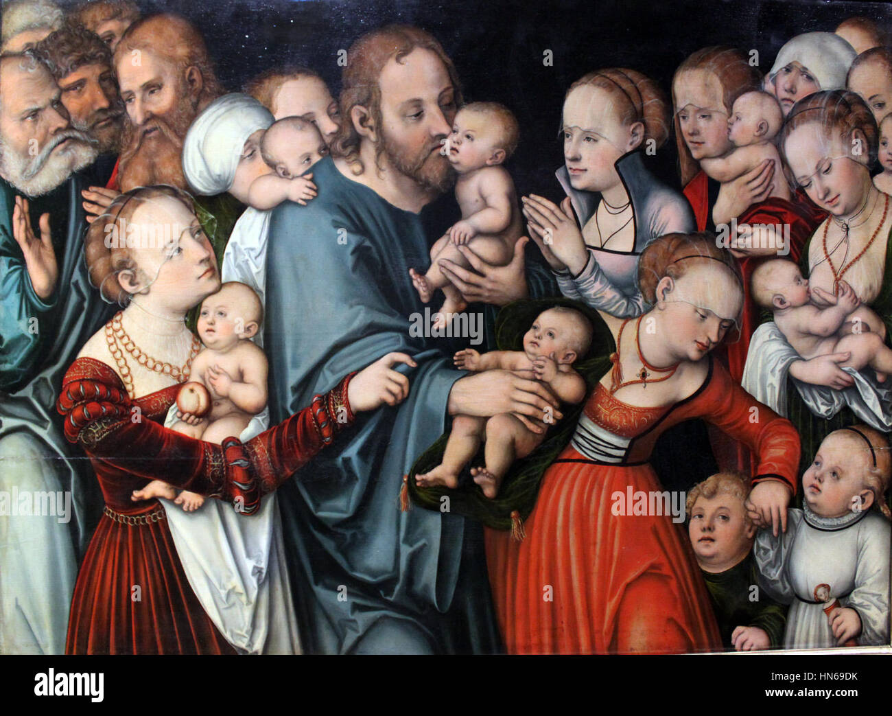 „Christus segnet die Kinder“ von Lucas Cranach dem Älteren, gemalt 1538, zeigt Christussegnende Kinder, ein gemeinsames religiöses Thema in der Renaissance-Kunst. Das Gemälde veranschaulicht das Mitgefühl und die Güte Christi. Stockfoto