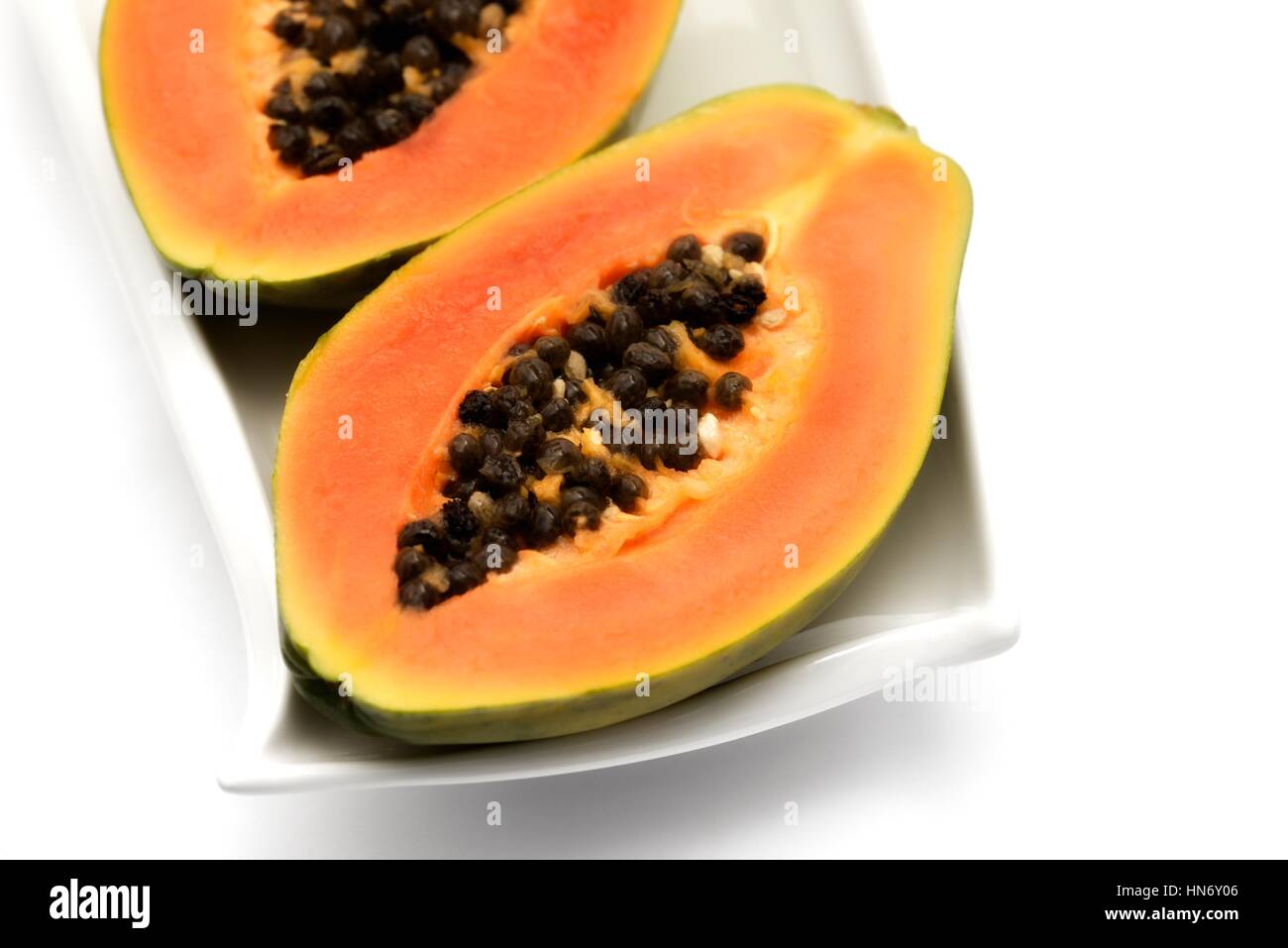 Papaya Frucht aufschneiden. Stockfoto
