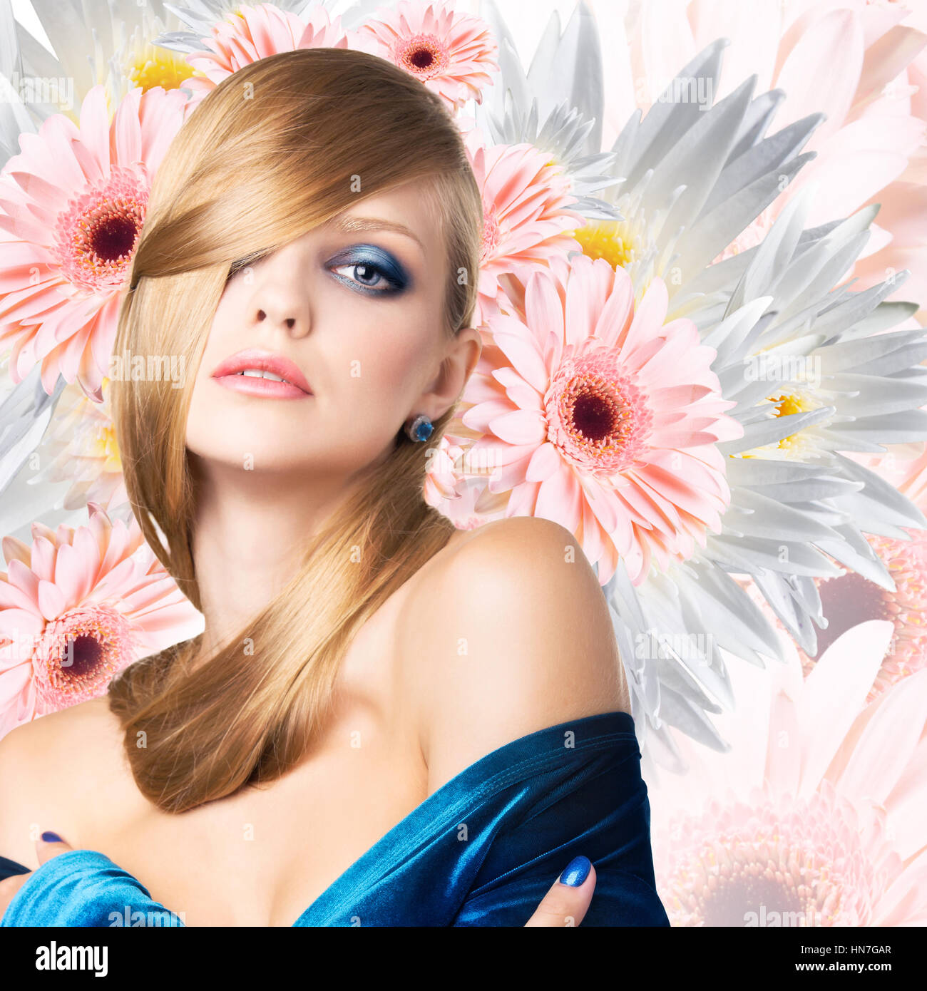 Mode-Modell über Bouquet von Blumen Hintergrund. Stockfoto
