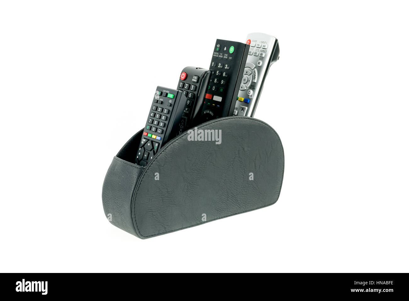 Fernbedienungen in Leder Halter isoliert auf weißem Hintergrund Stockfoto
