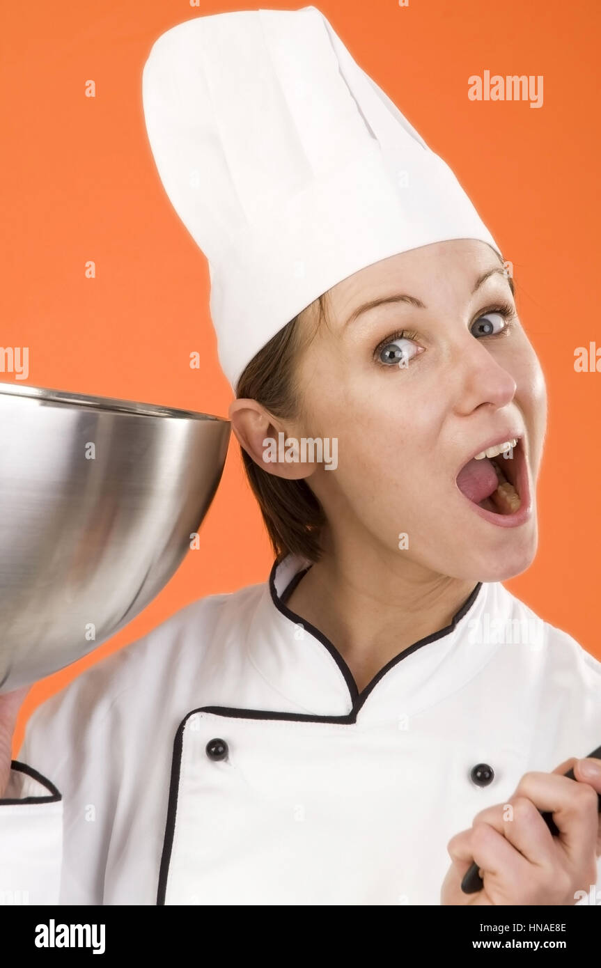 Junge Koechin - junge, weibliche Koch Stockfoto