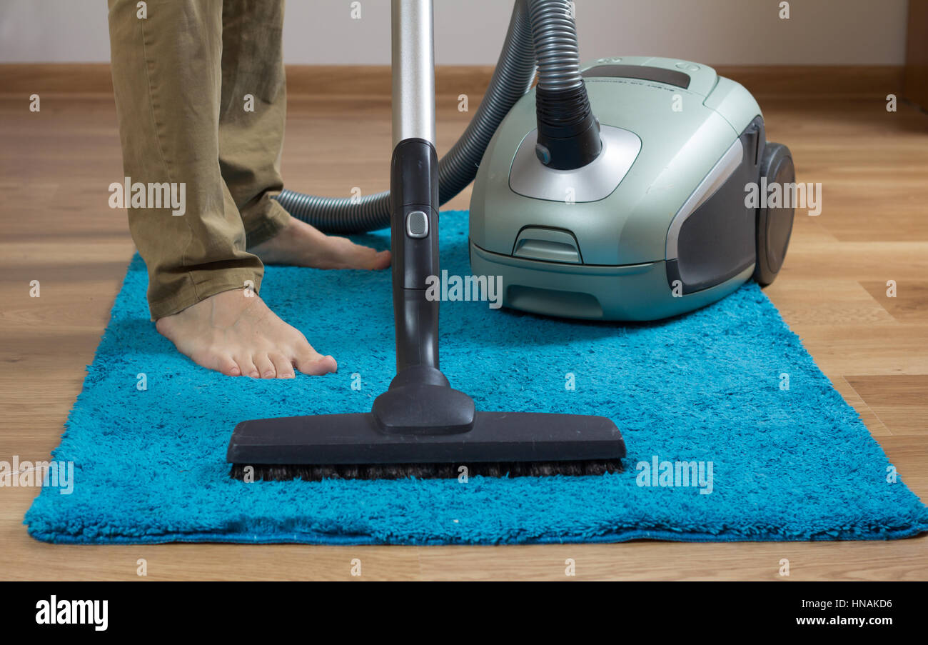 Teppich mit Reiniger Reinigung Stockfoto