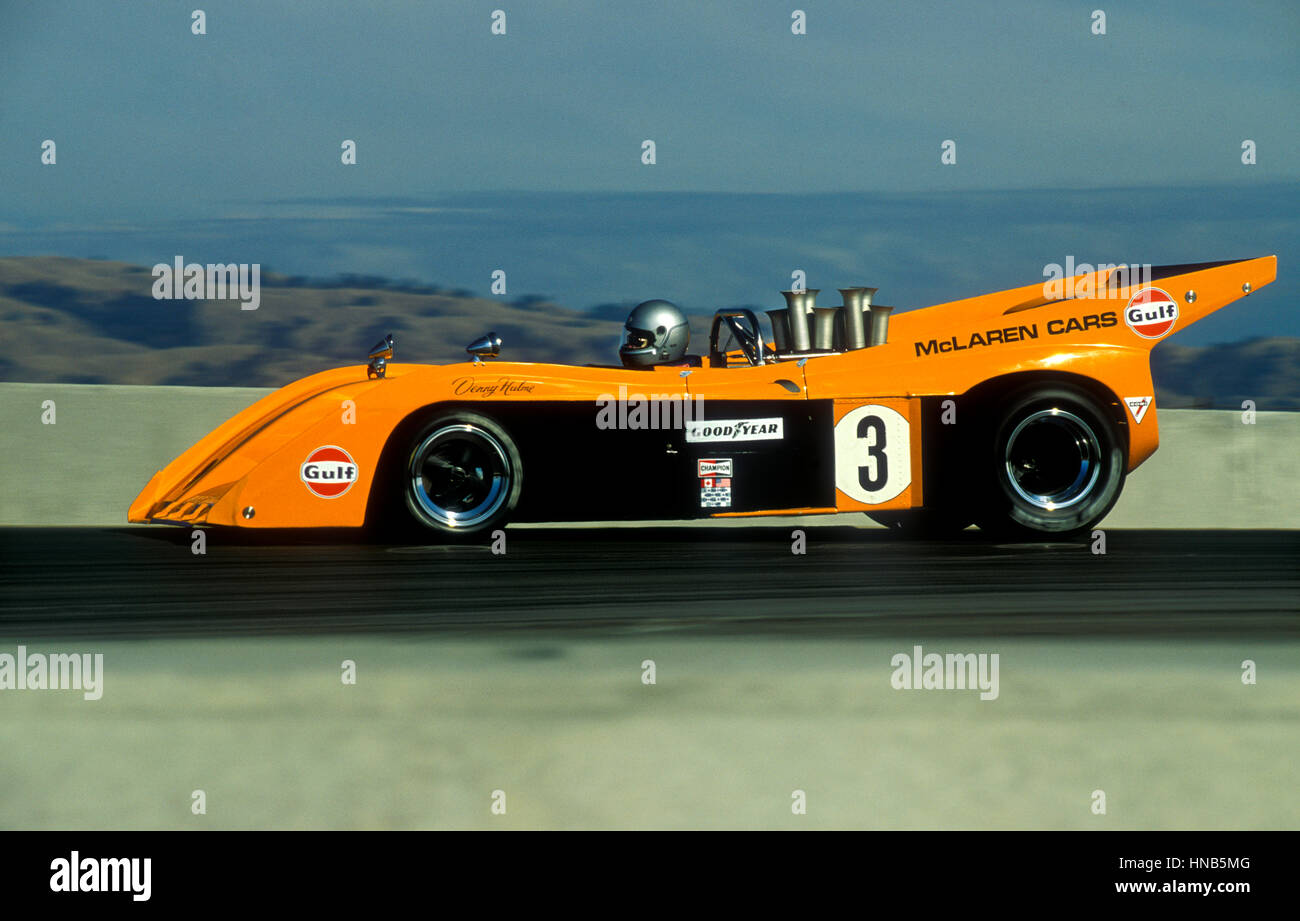 1960er Jahren verfolgen Denny Hulme kann bin Sport Rennwagen fahren in Laguna Seca Rennen 1987 Stockfoto