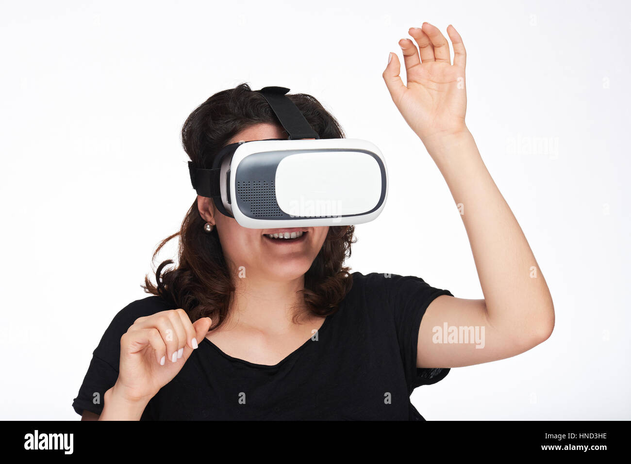 junge Frau in der virtuellen Realität isoliert auf weißem Hintergrund Stockfoto