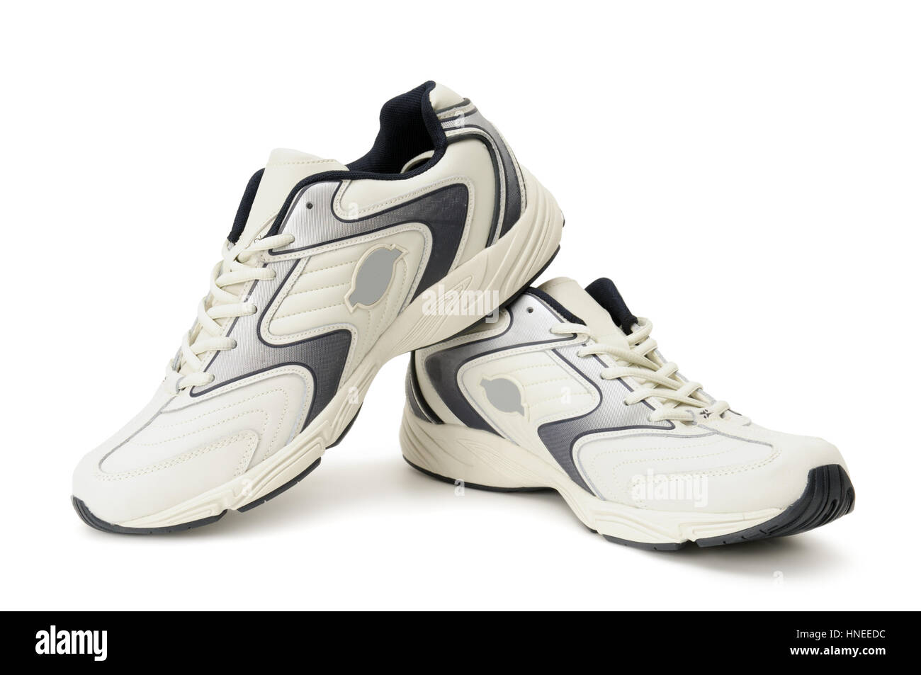 isoliert auf einem weißen Sneakers Stockfoto