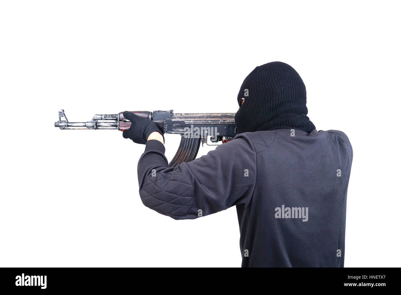 Terrorist mit Maschinengewehr ak47 isoliert auf weißem Hintergrund Stockfoto
