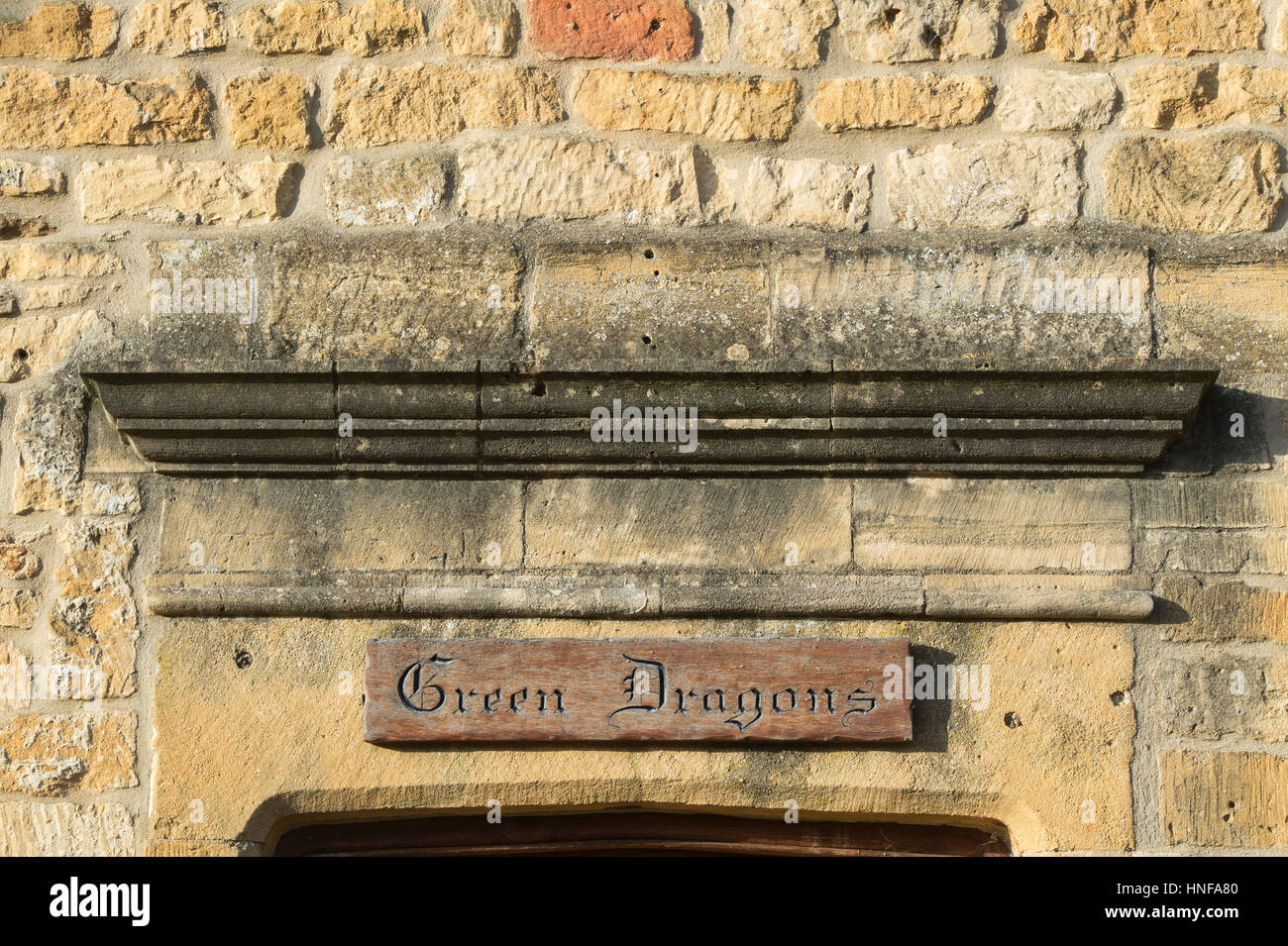 Grüne Drachen Hauszeichen. Chipping Campden, Cotswolds, Gloucestershire, England Stockfoto